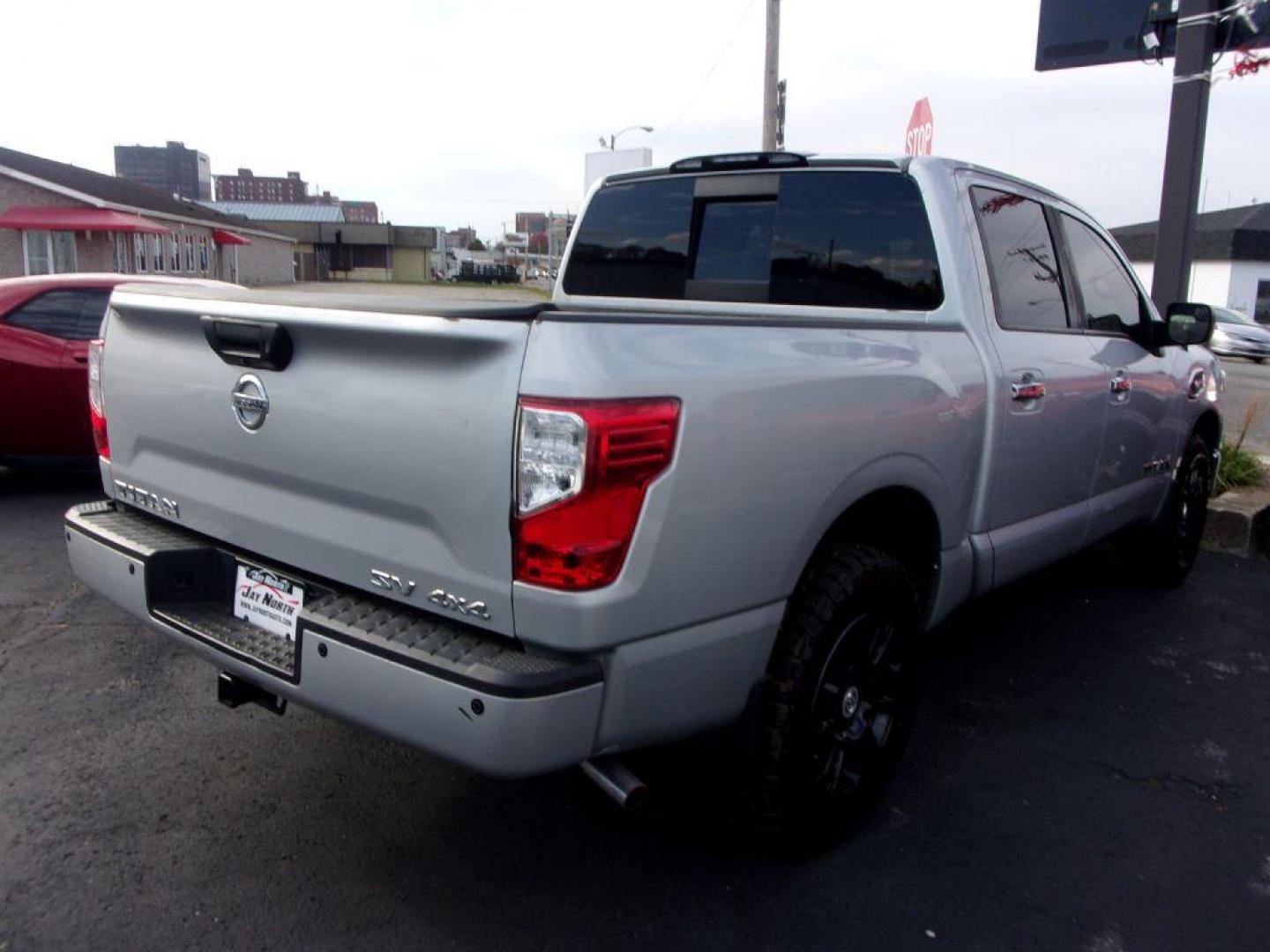 2017 SILVER NISSAN TITAN SV (1N6AA1E56HN) with an 5.6L engine, Automatic transmission, located at 501 E. Columbia St., Springfield, OH, 45503, (800) 262-7122, 39.925262, -83.801796 - *** 5.6L V8 4x4 *** Back Up Camera *** New AT Tires *** Heated Seats *** Tow *** Crew Cab *** Navigation w/ Premium Audio *** Parking Sensors *** Power Slide Rear Window *** Blind Spot *** Serviced and Detailed *** Jay North Auto has offered hand picked vehicles since 1965! Our customer's enjoy - Photo#3