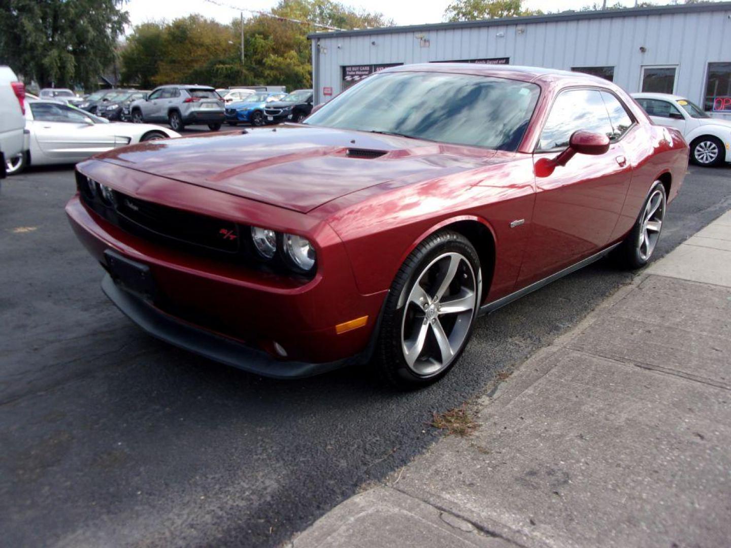 2014 MAROON DODGE CHALLENGER R/T (2C3CDYBT3EH) with an 5.7L engine, Automatic transmission, located at 501 E. Columbia St., Springfield, OH, 45503, (800) 262-7122, 39.925262, -83.801796 - *** R/T *** 5.7L HEMI V8 *** Heated Leather Seating *** Moonroof *** Premium Audio w/ Navigation *** Serviced and Detailed *** NICE!!!! *** Jay North Auto has offered hand picked vehicles since 1965! Our customer's enjoy a NO pressure buying experience with a small town feel. All of our vehicle - Photo#1