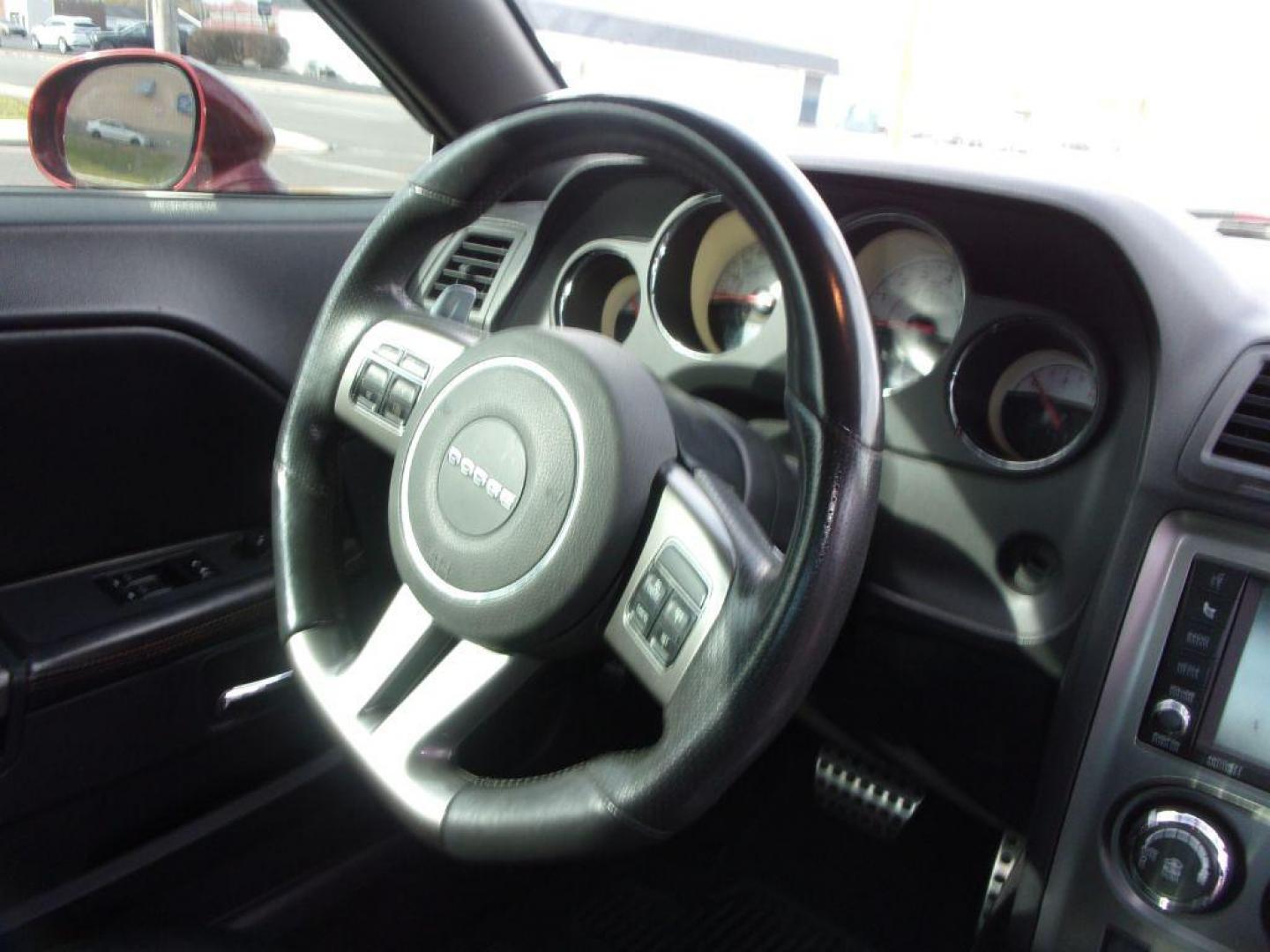 2014 MAROON DODGE CHALLENGER R/T (2C3CDYBT3EH) with an 5.7L engine, Automatic transmission, located at 501 E. Columbia St., Springfield, OH, 45503, (800) 262-7122, 39.925262, -83.801796 - *** R/T *** 5.7L HEMI V8 *** Heated Leather Seating *** Moonroof *** Premium Audio w/ Navigation *** Serviced and Detailed *** NICE!!!! *** Jay North Auto has offered hand picked vehicles since 1965! Our customer's enjoy a NO pressure buying experience with a small town feel. All of our vehicle - Photo#2