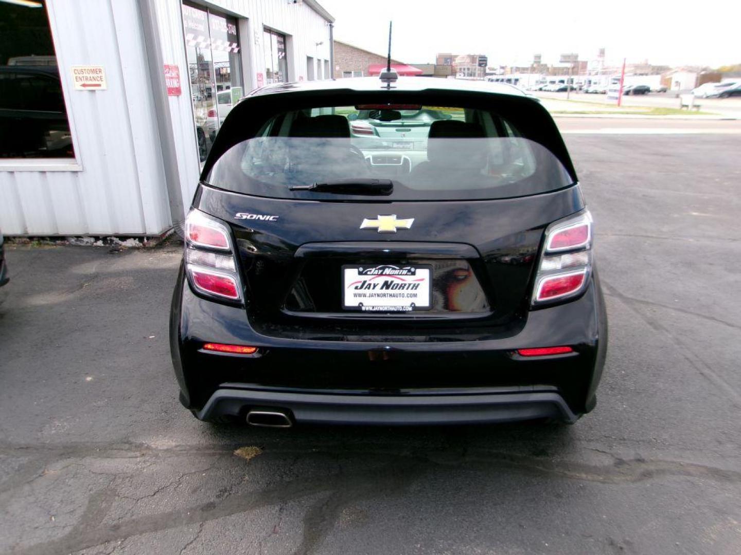 2018 BLACK CHEVROLET SONIC LT (1G1JG6SH4J4) with an 1.8L engine, Automatic transmission, located at 501 E. Columbia St., Springfield, OH, 45503, (800) 262-7122, 39.925262, -83.801796 - Photo#3