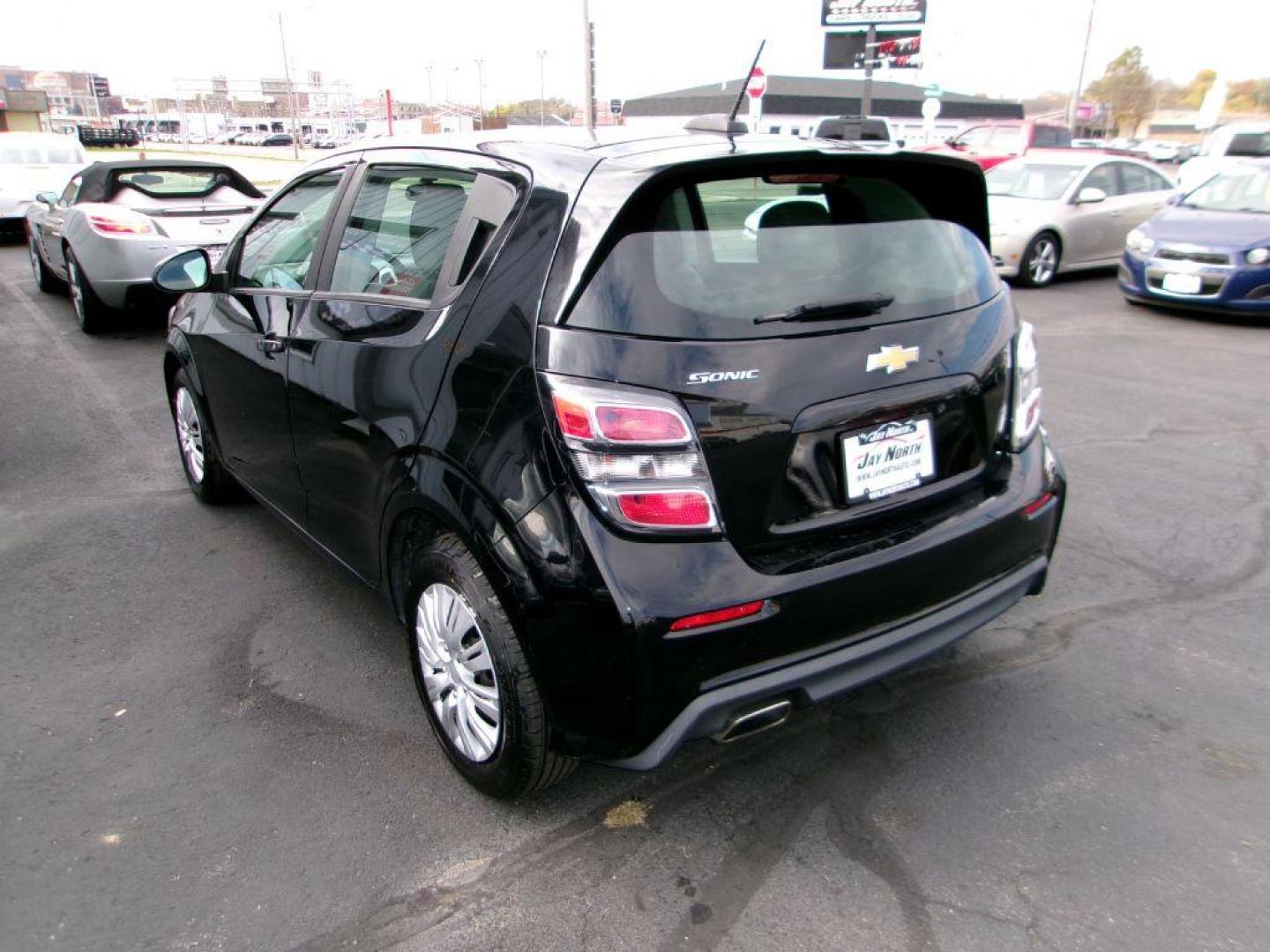 2018 BLACK CHEVROLET SONIC LT (1G1JG6SH4J4) with an 1.8L engine, Automatic transmission, located at 501 E. Columbia St., Springfield, OH, 45503, (800) 262-7122, 39.925262, -83.801796 - Photo#4