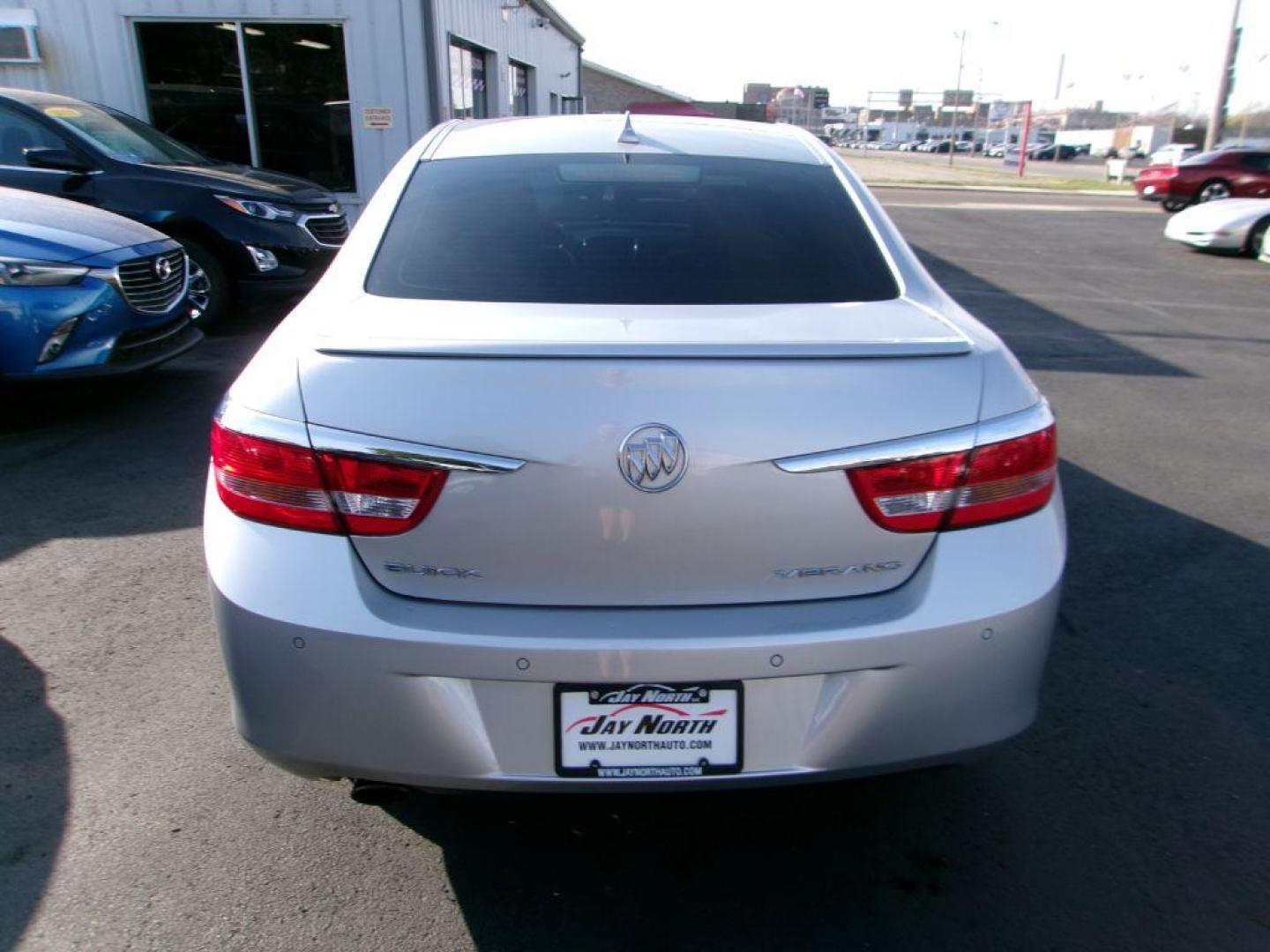 2013 SILVER BUICK VERANO LEATHER (1G4PS5SK0D4) with an 2.4L engine, Automatic transmission, located at 501 E. Columbia St., Springfield, OH, 45503, (800) 262-7122, 39.925262, -83.801796 - *** 25 Service Records on Clean CarFax ** Remote Start *** Leather *** Moonroof *** Jay North Auto has offered hand picked vehicles since 1965! Our customer's enjoy a NO pressure buying experience with a small town feel. All of our vehicles get fully inspected and detailed. We are a preferred d - Photo#4