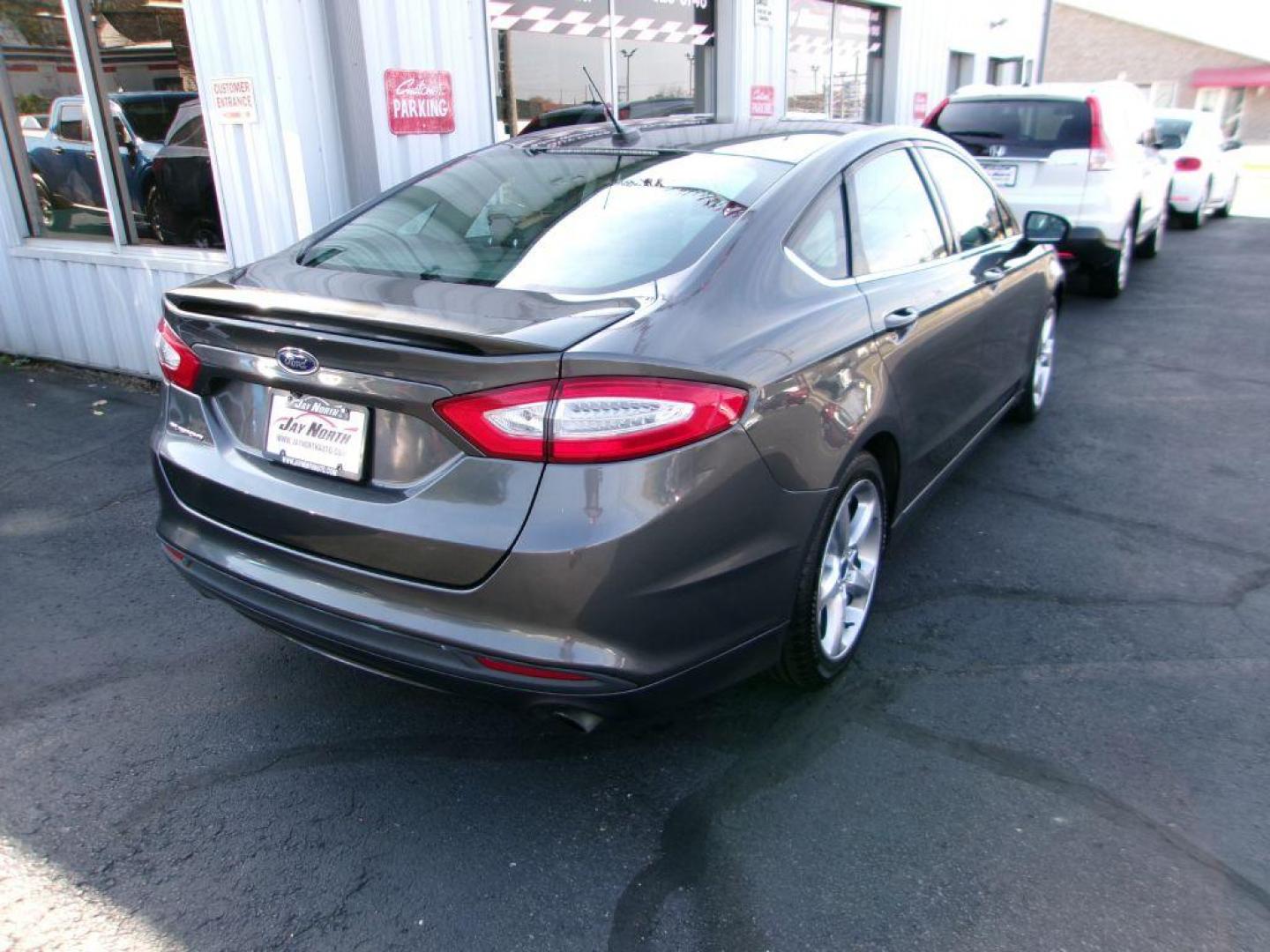 2016 GRAY FORD FUSION S (3FA6P0G75GR) with an 2.5L engine, Automatic transmission, located at 501 E. Columbia St., Springfield, OH, 45503, (800) 262-7122, 39.925262, -83.801796 - ***38 Service Records on CarFax *** Serviced and Detailed *** S w/ appearance package *** NICE *** FWD *** Back Up Camera *** Alloy Wheels *** Jay North Auto has offered hand picked vehicles since 1965! Our customer's enjoy a NO pressure buying experience with a small town feel. All of our vehi - Photo#3