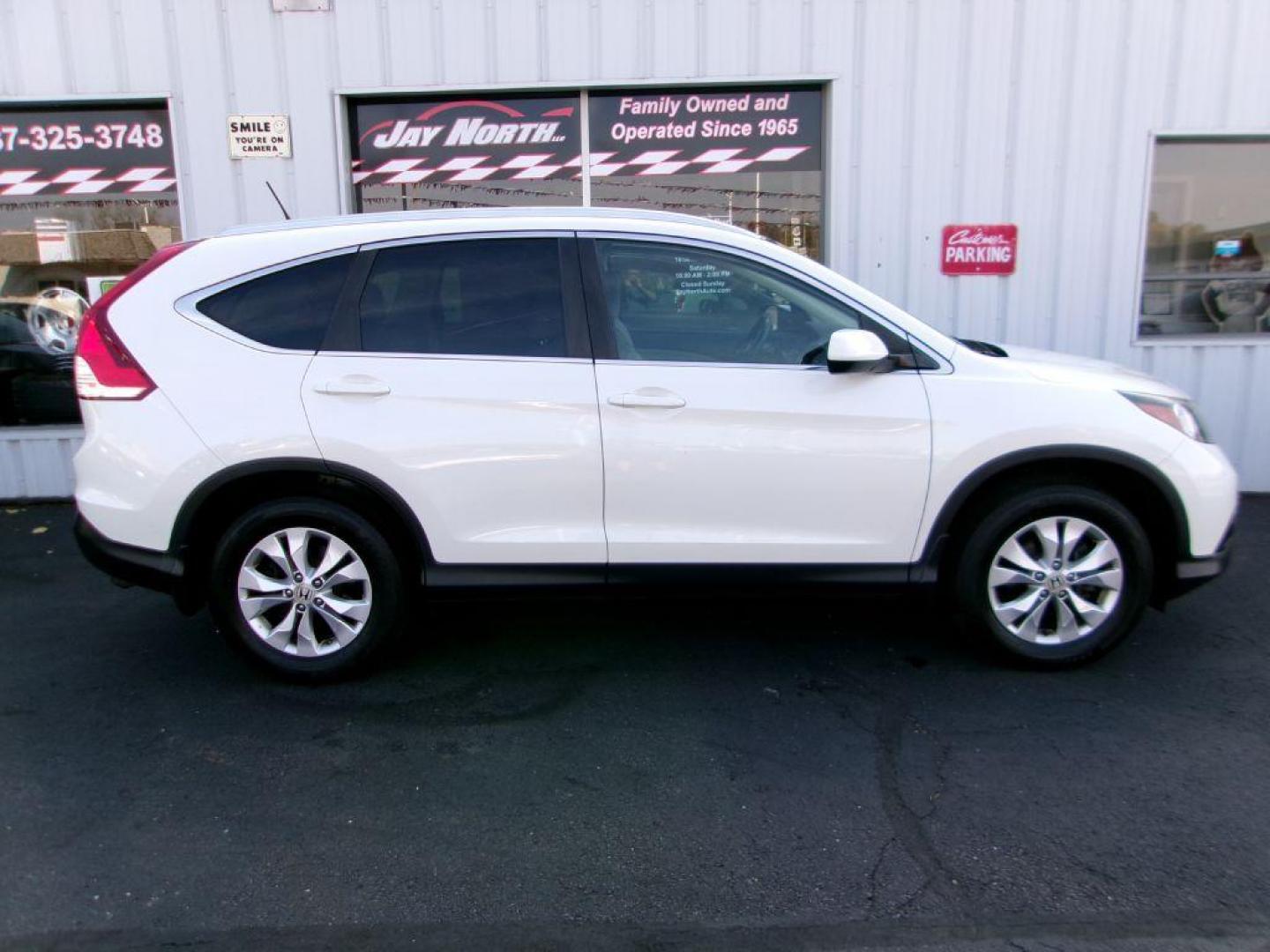 2013 WHITE HONDA CR-V EXL (5J6RM4H71DL) with an 2.4L engine, Automatic transmission, located at 501 E. Columbia St., Springfield, OH, 45503, (800) 262-7122, 39.925262, -83.801796 - *** 1 Owner w/ 27 service records on CarFax *** EXL with Heated Leather and Moonroof *** All Wheel Drive *** Back Up Camera *** NICE *** Jay North Auto has offered hand picked vehicles since 1965! Our customer's enjoy a NO pressure buying experience with a small town feel. All of our vehicles ge - Photo#0