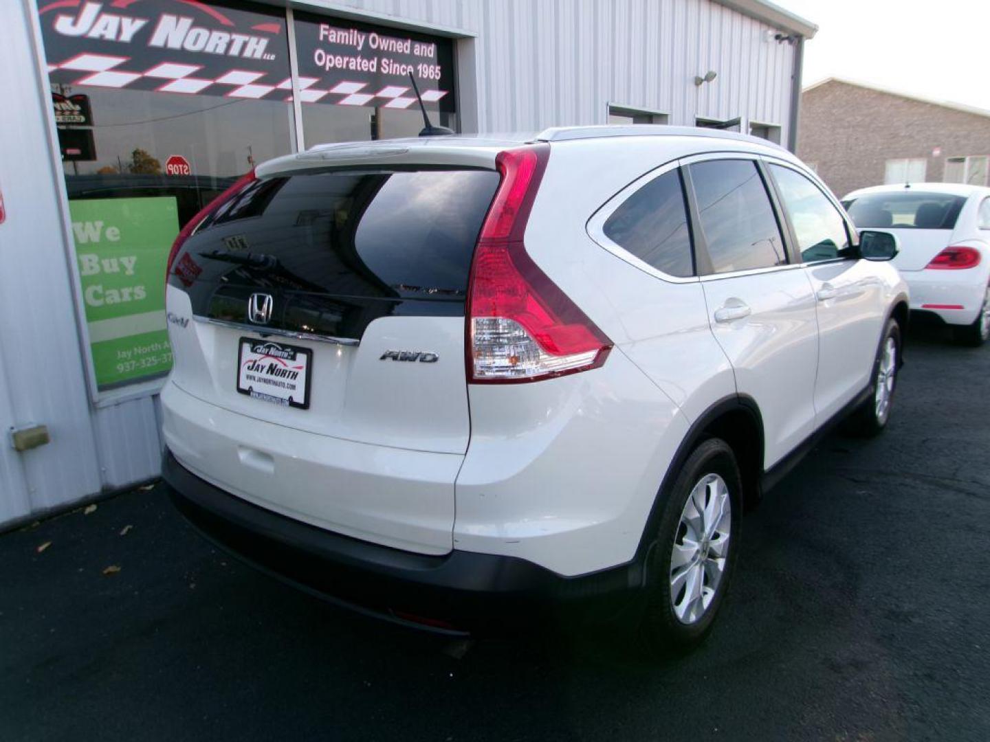 2013 WHITE HONDA CR-V EXL (5J6RM4H71DL) with an 2.4L engine, Automatic transmission, located at 501 E. Columbia St., Springfield, OH, 45503, (800) 262-7122, 39.925262, -83.801796 - *** 1 Owner w/ 27 service records on CarFax *** EXL with Heated Leather and Moonroof *** All Wheel Drive *** Back Up Camera *** NICE *** Jay North Auto has offered hand picked vehicles since 1965! Our customer's enjoy a NO pressure buying experience with a small town feel. All of our vehicles ge - Photo#3