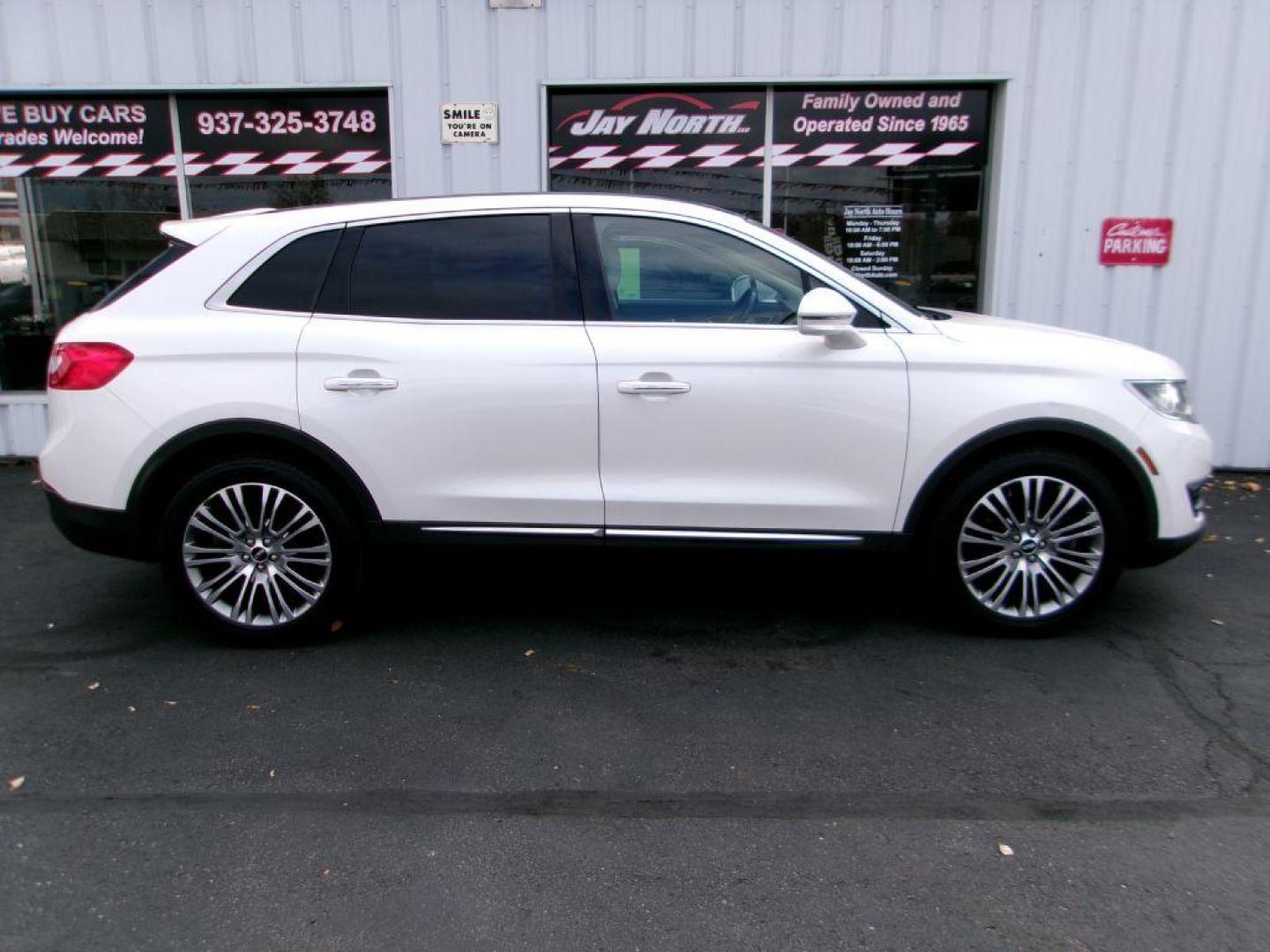 2016 WHITE LINCOLN MKX RESERVE (2LMTJ8LR2GB) with an 3.7L engine, Automatic transmission, located at 501 E. Columbia St., Springfield, OH, 45503, (800) 262-7122, 39.925262, -83.801796 - *** Serviced and Detailed *** 3.7L V6 AWD *** Revel Audio *** Heated Front and Rear Seating *** Panoramic Moonroof *** Navigation *** Remote Start *** NICE *** Jay North Auto has offered hand picked vehicles since 1965! Our customer's enjoy a NO pressure buying experience with a small town feel - Photo#0