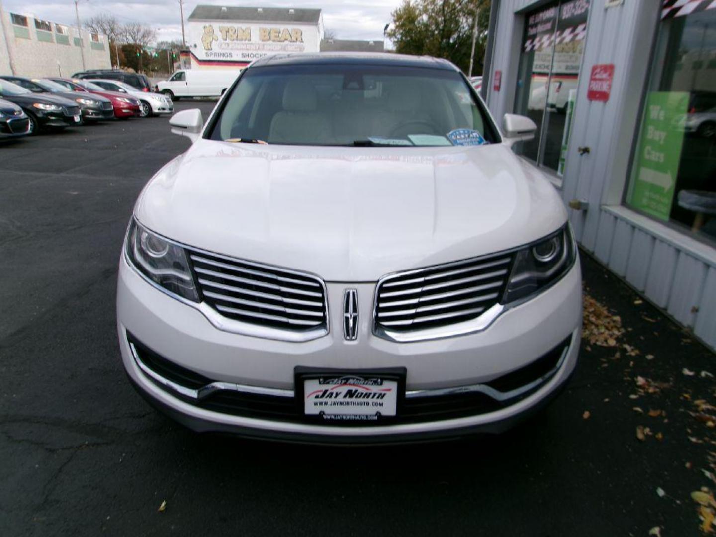 2016 WHITE LINCOLN MKX RESERVE (2LMTJ8LR2GB) with an 3.7L engine, Automatic transmission, located at 501 E. Columbia St., Springfield, OH, 45503, (800) 262-7122, 39.925262, -83.801796 - *** Serviced and Detailed *** 3.7L V6 AWD *** Revel Audio *** Heated Front and Rear Seating *** Panoramic Moonroof *** Navigation *** Remote Start *** NICE *** Jay North Auto has offered hand picked vehicles since 1965! Our customer's enjoy a NO pressure buying experience with a small town feel - Photo#2