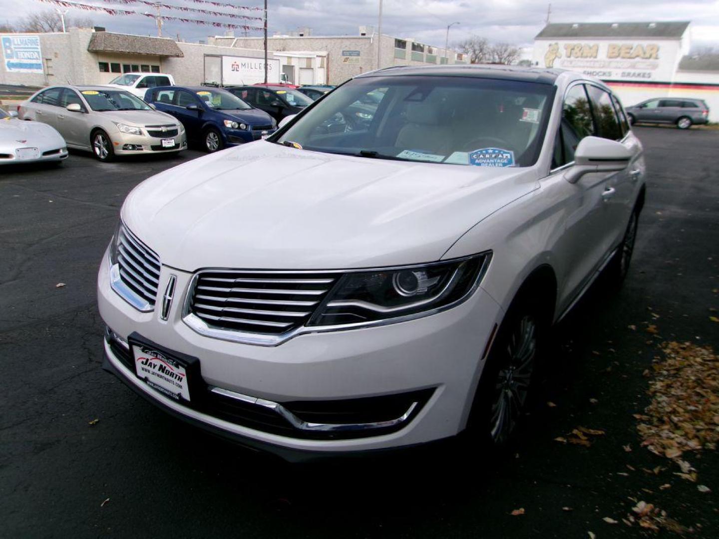 2016 WHITE LINCOLN MKX RESERVE (2LMTJ8LR2GB) with an 3.7L engine, Automatic transmission, located at 501 E. Columbia St., Springfield, OH, 45503, (800) 262-7122, 39.925262, -83.801796 - *** Serviced and Detailed *** 3.7L V6 AWD *** Revel Audio *** Heated Front and Rear Seating *** Panoramic Moonroof *** Navigation *** Remote Start *** NICE *** Jay North Auto has offered hand picked vehicles since 1965! Our customer's enjoy a NO pressure buying experience with a small town feel - Photo#3