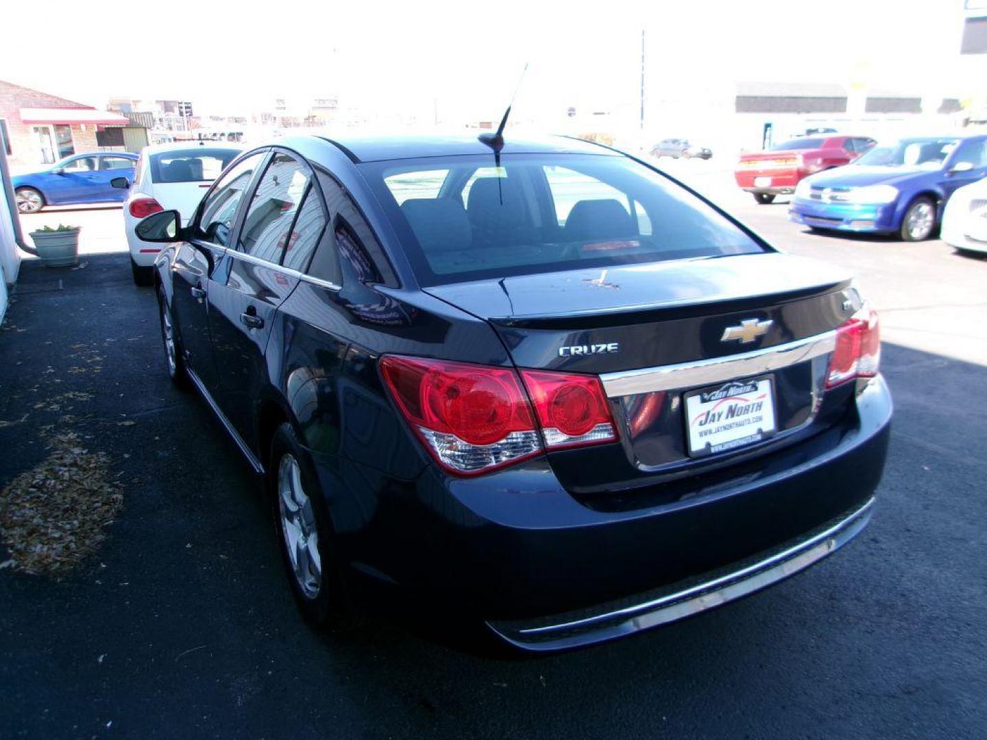 2014 BLACK CHEVROLET CRUZE LT (1G1PC5SBXE7) with an 1.4L engine, Automatic transmission, located at 501 E. Columbia St., Springfield, OH, 45503, (800) 262-7122, 39.925262, -83.801796 - ***Clean Carfax***LT***Only 84k Miles***Serviced and Detailed*** Jay North Auto has offered hand picked vehicles since 1965! Our customer's enjoy a NO pressure buying experience with a small town feel. All of our vehicles get fully inspected and detailed. We are a preferred dealer for many local - Photo#5