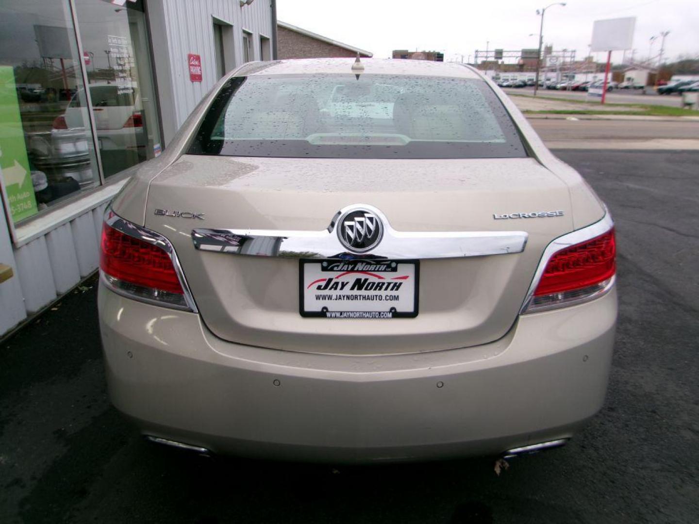 2012 GOLD BUICK LACROSSE PREMIUM (1G4GD5E3XCF) with an 3.6L engine, Automatic transmission, located at 501 E. Columbia St., Springfield, OH, 45503, (800) 262-7122, 39.925262, -83.801796 - Photo#5