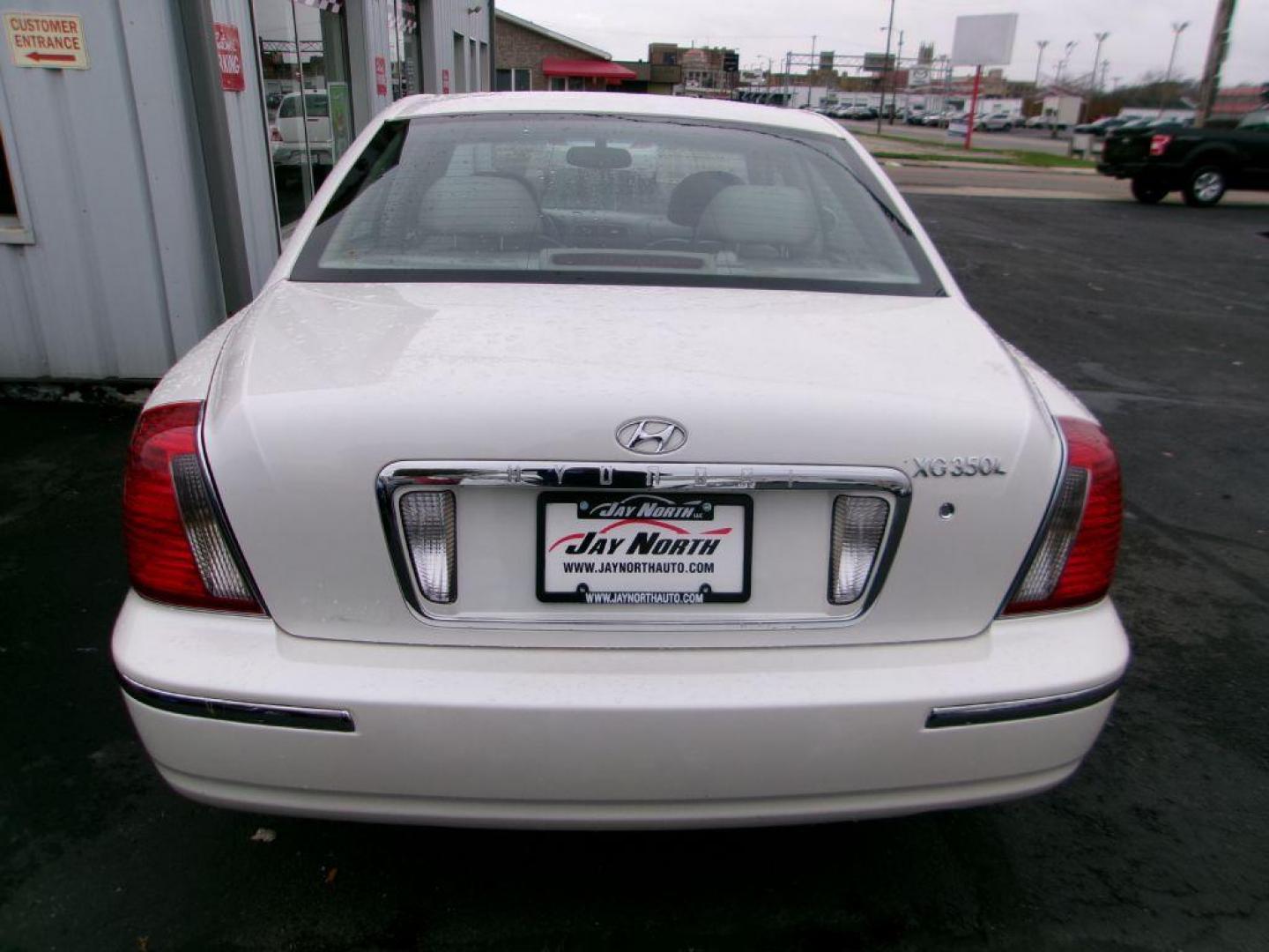 2004 WHITE HYUNDAI XG 350 L (KMHFU45E24A) with an 3.5L engine, Automatic transmission, located at 501 E. Columbia St., Springfield, OH, 45503, (800) 262-7122, 39.925262, -83.801796 - *** Serviced and Detailed *** 3.5L V6 *** 23 Service Records w/ Clean CarFax *** Jay North Auto has offered hand picked vehicles since 1965! Our customer's enjoy a NO pressure buying experience with a small town feel. All of our vehicles get fully inspected and detailed. We are a preferred de - Photo#5