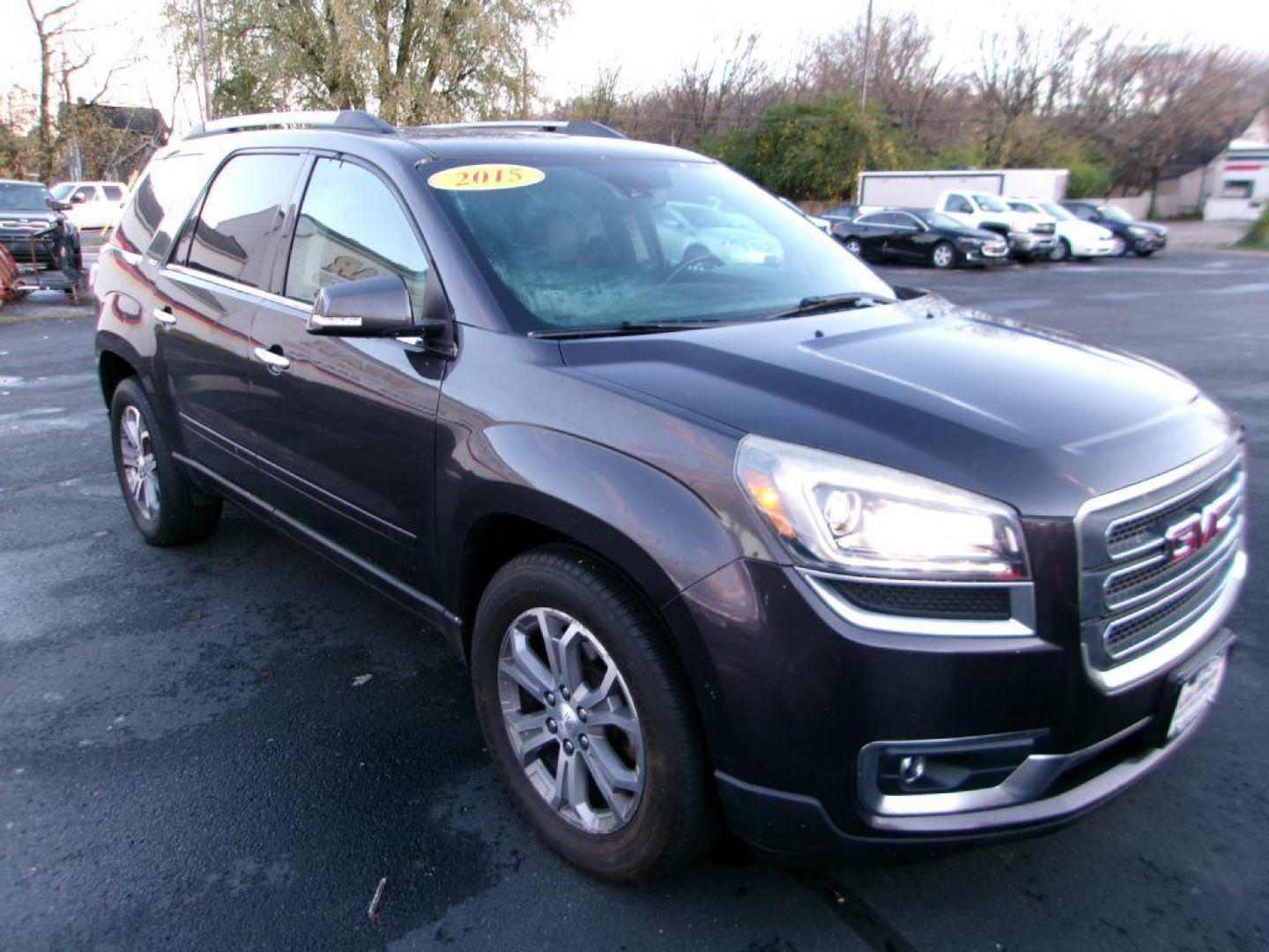 2015 GRAY GMC ACADIA SLT-1 (1GKKVRKDXFJ) with an 3.6L engine, Automatic transmission, located at 501 E. Columbia St., Springfield, OH, 45503, (800) 262-7122, 39.925262, -83.801796 - *** Serviced and Detailed *** Moonroof *** Remote Start *** Premium Audio w/ Back Up Camera *** 3rd Row Seating *** 2nd Row Captains Seats *** Leather *** All Wheel Drive *** Jay North Auto has offered hand picked vehicles since 1965! Our customer's enjoy a NO pressure buying experience with a - Photo#1