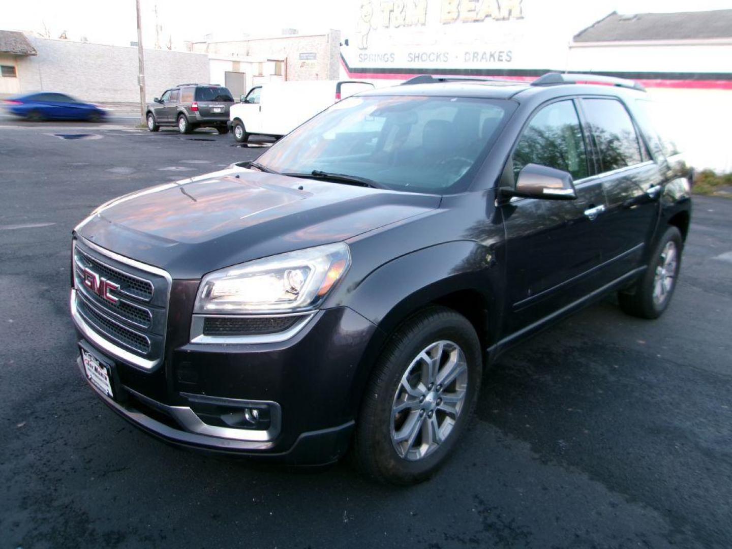 2015 GRAY GMC ACADIA SLT-1 (1GKKVRKDXFJ) with an 3.6L engine, Automatic transmission, located at 501 E. Columbia St., Springfield, OH, 45503, (800) 262-7122, 39.925262, -83.801796 - *** Serviced and Detailed *** Moonroof *** Remote Start *** Premium Audio w/ Back Up Camera *** 3rd Row Seating *** 2nd Row Captains Seats *** Leather *** All Wheel Drive *** Jay North Auto has offered hand picked vehicles since 1965! Our customer's enjoy a NO pressure buying experience with a - Photo#2