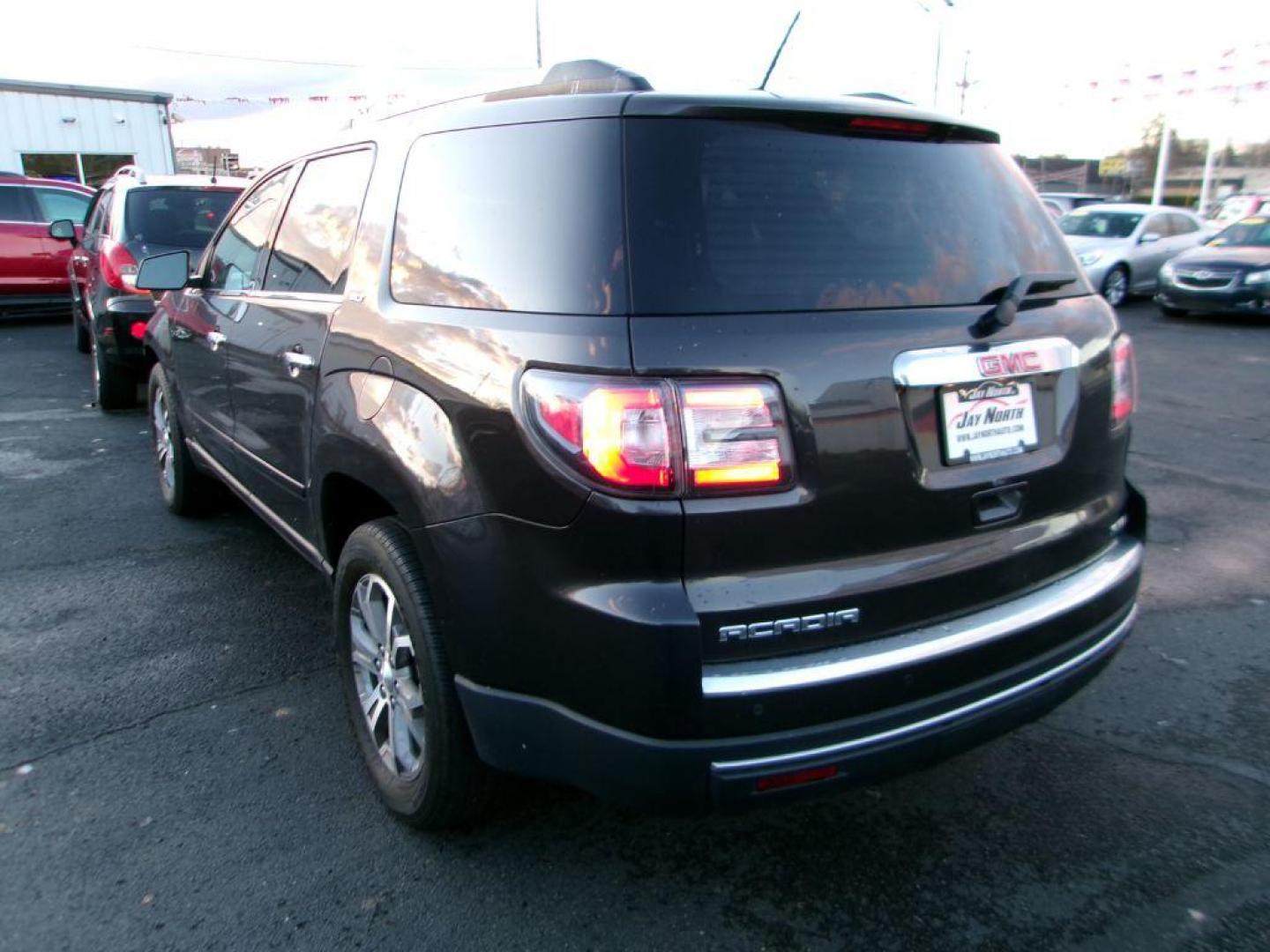 2015 GRAY GMC ACADIA SLT-1 (1GKKVRKDXFJ) with an 3.6L engine, Automatic transmission, located at 501 E. Columbia St., Springfield, OH, 45503, (800) 262-7122, 39.925262, -83.801796 - *** Serviced and Detailed *** Moonroof *** Remote Start *** Premium Audio w/ Back Up Camera *** 3rd Row Seating *** 2nd Row Captains Seats *** Leather *** All Wheel Drive *** Jay North Auto has offered hand picked vehicles since 1965! Our customer's enjoy a NO pressure buying experience with a - Photo#3