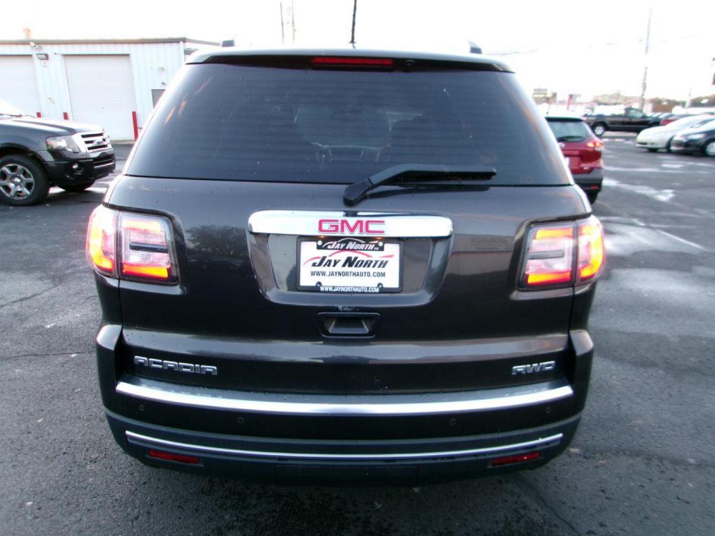 2015 GRAY GMC ACADIA SLT-1 (1GKKVRKDXFJ) with an 3.6L engine, Automatic transmission, located at 501 E. Columbia St., Springfield, OH, 45503, (800) 262-7122, 39.925262, -83.801796 - *** Serviced and Detailed *** Moonroof *** Remote Start *** Premium Audio w/ Back Up Camera *** 3rd Row Seating *** 2nd Row Captains Seats *** Leather *** All Wheel Drive *** Jay North Auto has offered hand picked vehicles since 1965! Our customer's enjoy a NO pressure buying experience with a - Photo#4