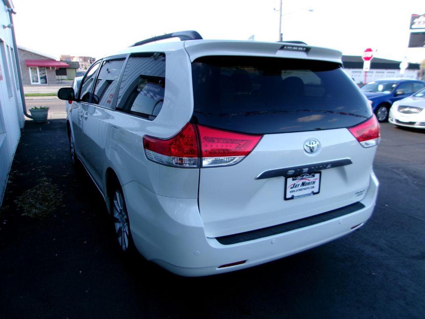 2014 WHITE TOYOTA SIENNA LIMITED (5TDDK3DC0ES) with an 3.5L engine, Automatic transmission, located at 501 E. Columbia St., Springfield, OH, 45503, (800) 262-7122, 39.925262, -83.801796 - ***Limited***LOADED***Heated Leather Seating***Dual Moon Roof***Blind Spot***AWD***1-Owner***Serviced and Detailed*** Jay North Auto has offered hand picked vehicles since 1965! Our customer's enjoy a NO pressure buying experience with a small town feel. All of our vehicles get fully inspected a - Photo#5