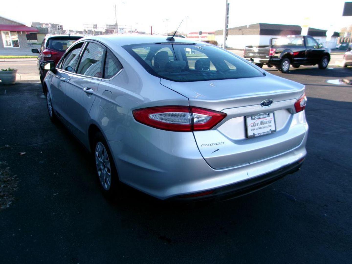 2014 SILVER FORD FUSION S (3FA6P0G71ER) with an 2.5L engine, Automatic transmission, located at 501 E. Columbia St., Springfield, OH, 45503, (800) 262-7122, 39.925262, -83.801796 - ** S ** Serviced and Detailed *** 2.5L *** FWD *** 34 MPG HWY *** Jay North Auto has offered hand picked vehicles since 1965! Our customer's enjoy a NO pressure buying experience with a small town feel. All of our vehicles get fully inspected and detailed. We are a preferred dealer for many loca - Photo#5