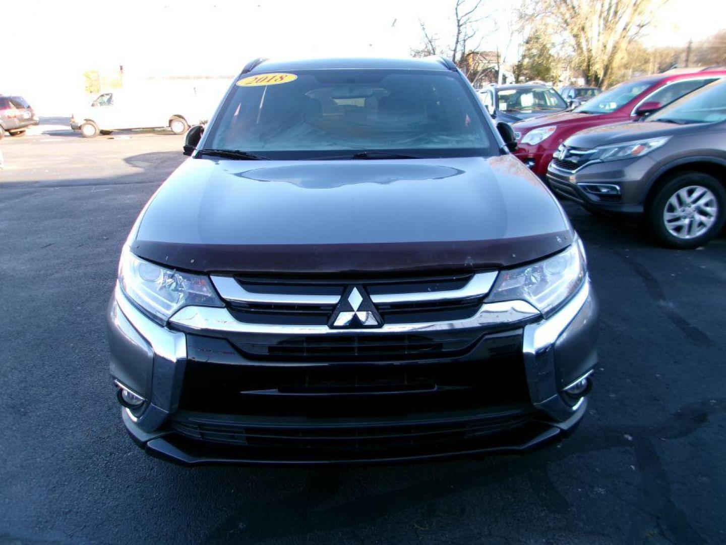 2018 GRAY MITSUBISHI OUTLANDER LE (JA4AD3A31JZ) with an 2.4L engine, Automatic transmission, located at 501 E. Columbia St., Springfield, OH, 45503, (800) 262-7122, 39.925262, -83.801796 - ***Outlander***Clean Carfax***LE***New Tires***New Front and Rear Pads and Rotors***Serviced and Detailed*** Limited Edition Features INCLUDED Power Glass Sunroof with Sunshade and Tilt Feature Blind Spot Warning (BSW) with Rear Cross Traffic Alert (RCTA) and Lane Change Assist (LCA) 18'' - Photo#1