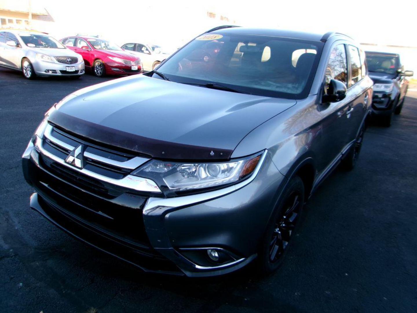 2018 GRAY MITSUBISHI OUTLANDER LE (JA4AD3A31JZ) with an 2.4L engine, Automatic transmission, located at 501 E. Columbia St., Springfield, OH, 45503, (800) 262-7122, 39.925262, -83.801796 - ***Outlander***Clean Carfax***LE***New Tires***New Front and Rear Pads and Rotors***Serviced and Detailed*** Limited Edition Features INCLUDED Power Glass Sunroof with Sunshade and Tilt Feature Blind Spot Warning (BSW) with Rear Cross Traffic Alert (RCTA) and Lane Change Assist (LCA) 18'' - Photo#5