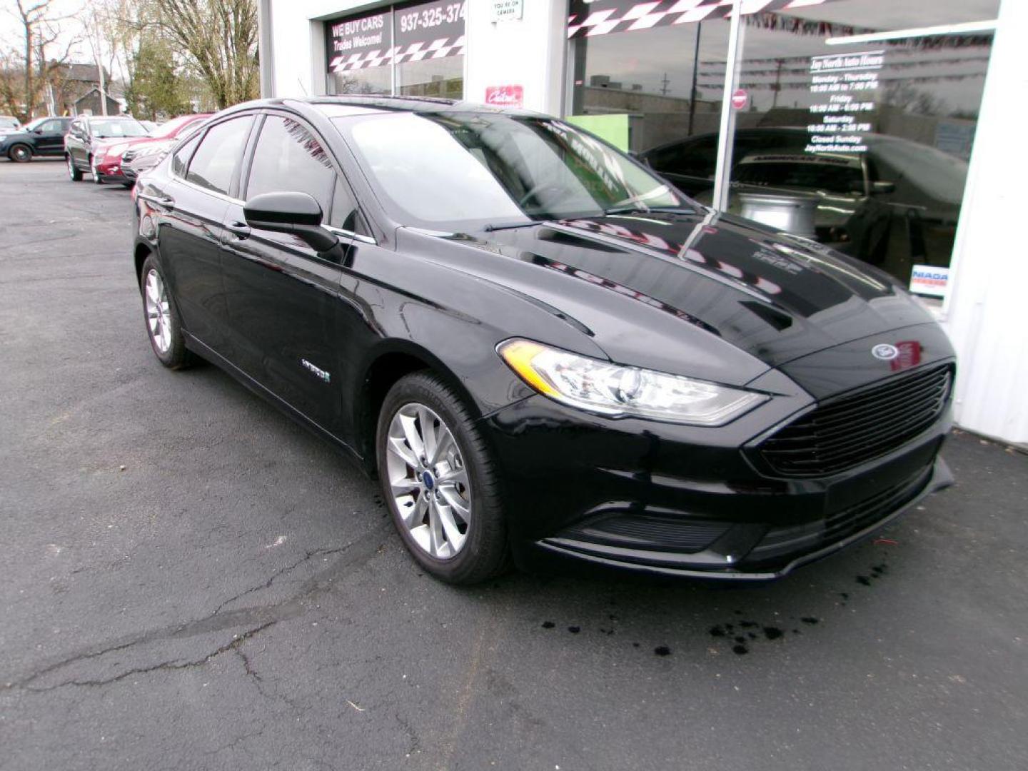 2017 BLACK FORD FUSION SE HYBRID (3FA6P0LU1HR) with an 2.0L engine, Continuously Variable transmission, located at 501 E. Columbia St., Springfield, OH, 45503, (800) 262-7122, 39.925262, -83.801796 - Photo#2