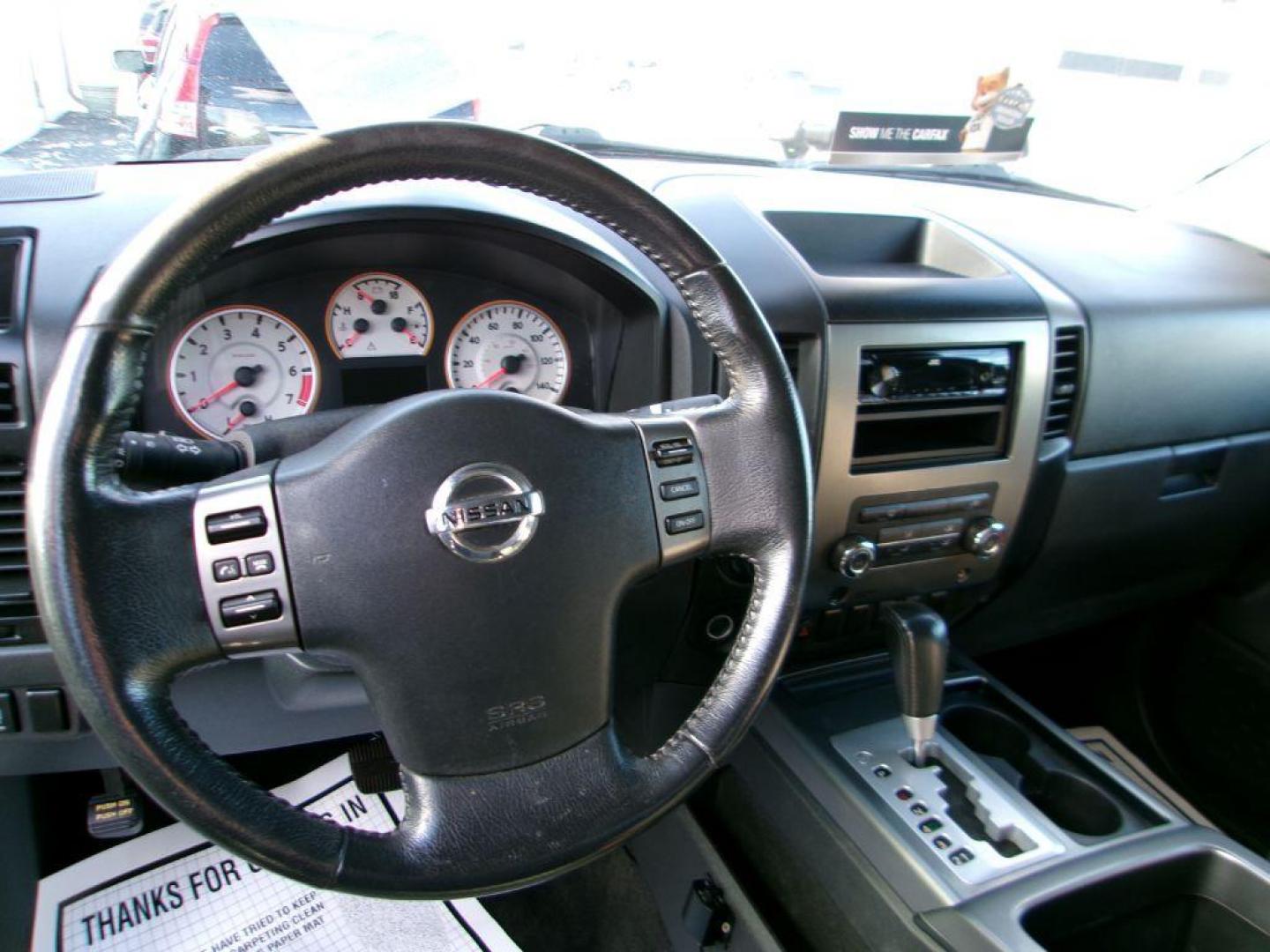 2012 WHITE NISSAN TITAN SV (1N6AA0CJ2CN) with an 5.6L engine, Automatic transmission, located at 501 E. Columbia St., Springfield, OH, 45503, (800) 262-7122, 39.925262, -83.801796 - ***SV***Clean Carfax***Like New Tires***New Front and Rear Pads and Rotors***4X4***Serviced and Detailed*** Jay North Auto has offered hand picked vehicles since 1965! Our customer's enjoy a NO pressure buying experience with a small town feel. All of our vehicles get fully inspected and detaile - Photo#9