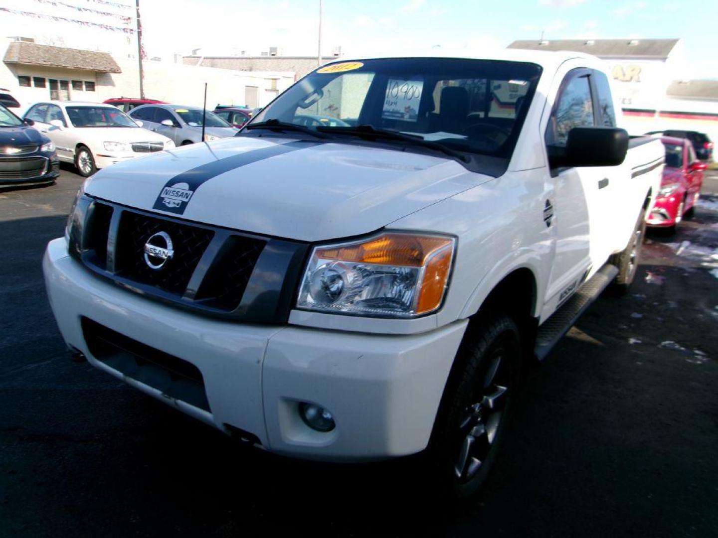 2012 WHITE NISSAN TITAN SV (1N6AA0CJ2CN) with an 5.6L engine, Automatic transmission, located at 501 E. Columbia St., Springfield, OH, 45503, (800) 262-7122, 39.925262, -83.801796 - ***SV***Clean Carfax***Like New Tires***New Front and Rear Pads and Rotors***4X4***Serviced and Detailed*** Jay North Auto has offered hand picked vehicles since 1965! Our customer's enjoy a NO pressure buying experience with a small town feel. All of our vehicles get fully inspected and detaile - Photo#6