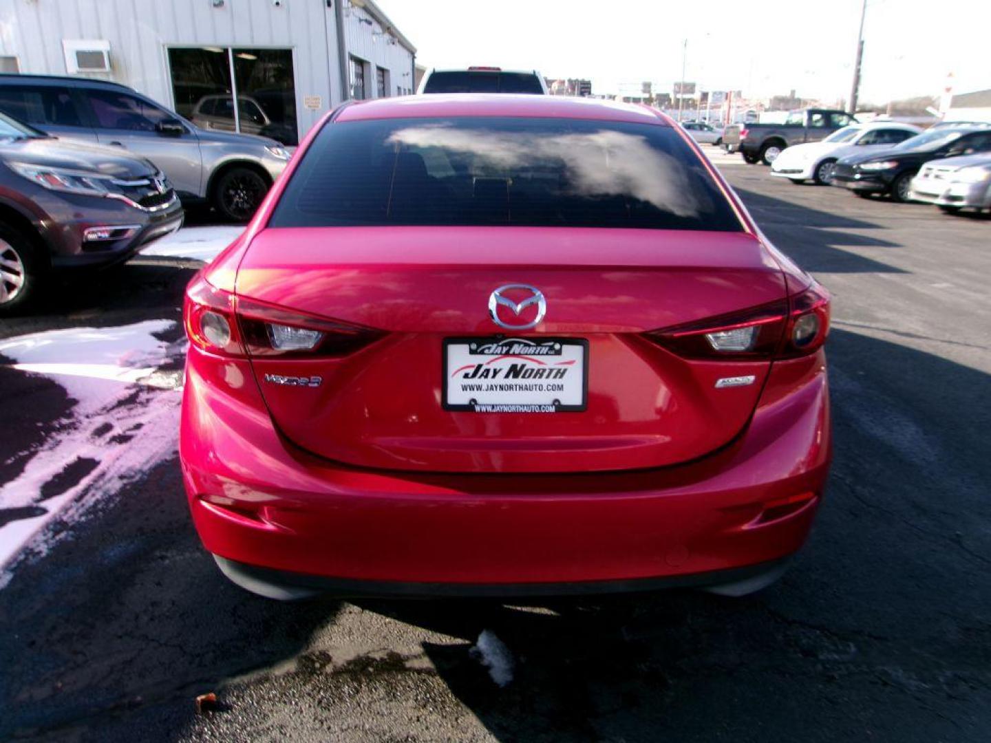 2016 RED MAZDA 3 SPORT (3MZBM1U77GM) with an 2.0L engine, Automatic transmission, located at 501 E. Columbia St., Springfield, OH, 45503, (800) 262-7122, 39.925262, -83.801796 - *** Sport *** Serviced and Detailed *** Back Up Camera *** 2.0L FWD *** Jay North Auto has offered hand picked vehicles since 1965! Our customer's enjoy a NO pressure buying experience with a small town feel. All of our vehicles get fully inspected and detailed. We are a preferred dealer for man - Photo#4