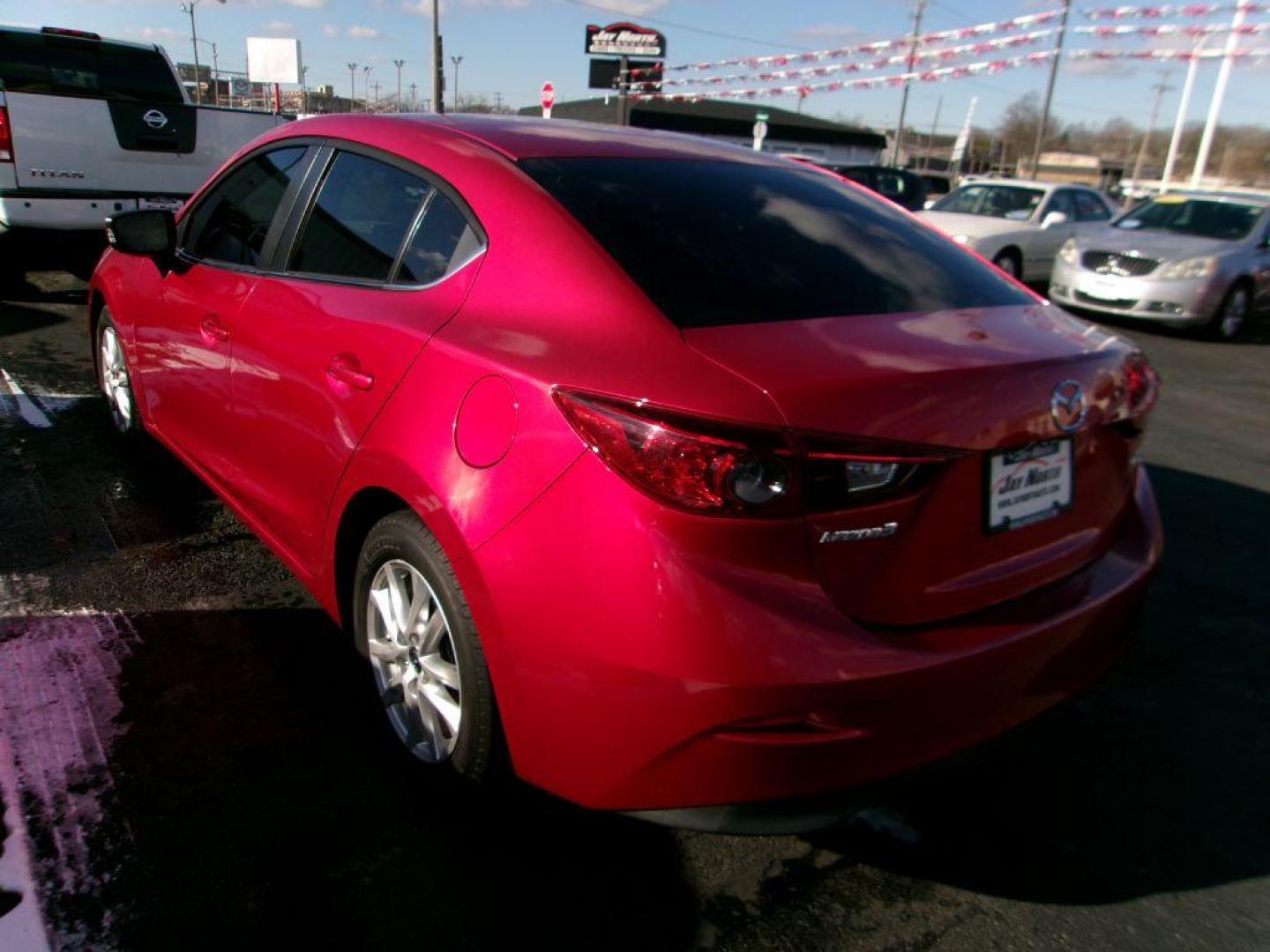 2016 RED MAZDA 3 SPORT (3MZBM1U77GM) with an 2.0L engine, Automatic transmission, located at 501 E. Columbia St., Springfield, OH, 45503, (800) 262-7122, 39.925262, -83.801796 - *** Sport *** Serviced and Detailed *** Back Up Camera *** 2.0L FWD *** Jay North Auto has offered hand picked vehicles since 1965! Our customer's enjoy a NO pressure buying experience with a small town feel. All of our vehicles get fully inspected and detailed. We are a preferred dealer for man - Photo#5