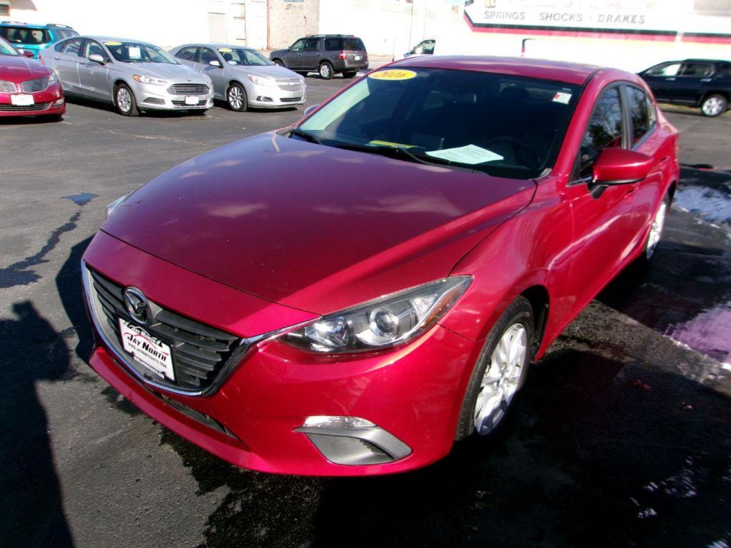 2016 RED MAZDA 3 SPORT (3MZBM1U77GM) with an 2.0L engine, Automatic transmission, located at 501 E. Columbia St., Springfield, OH, 45503, (800) 262-7122, 39.925262, -83.801796 - *** Sport *** Serviced and Detailed *** Back Up Camera *** 2.0L FWD *** Jay North Auto has offered hand picked vehicles since 1965! Our customer's enjoy a NO pressure buying experience with a small town feel. All of our vehicles get fully inspected and detailed. We are a preferred dealer for man - Photo#6