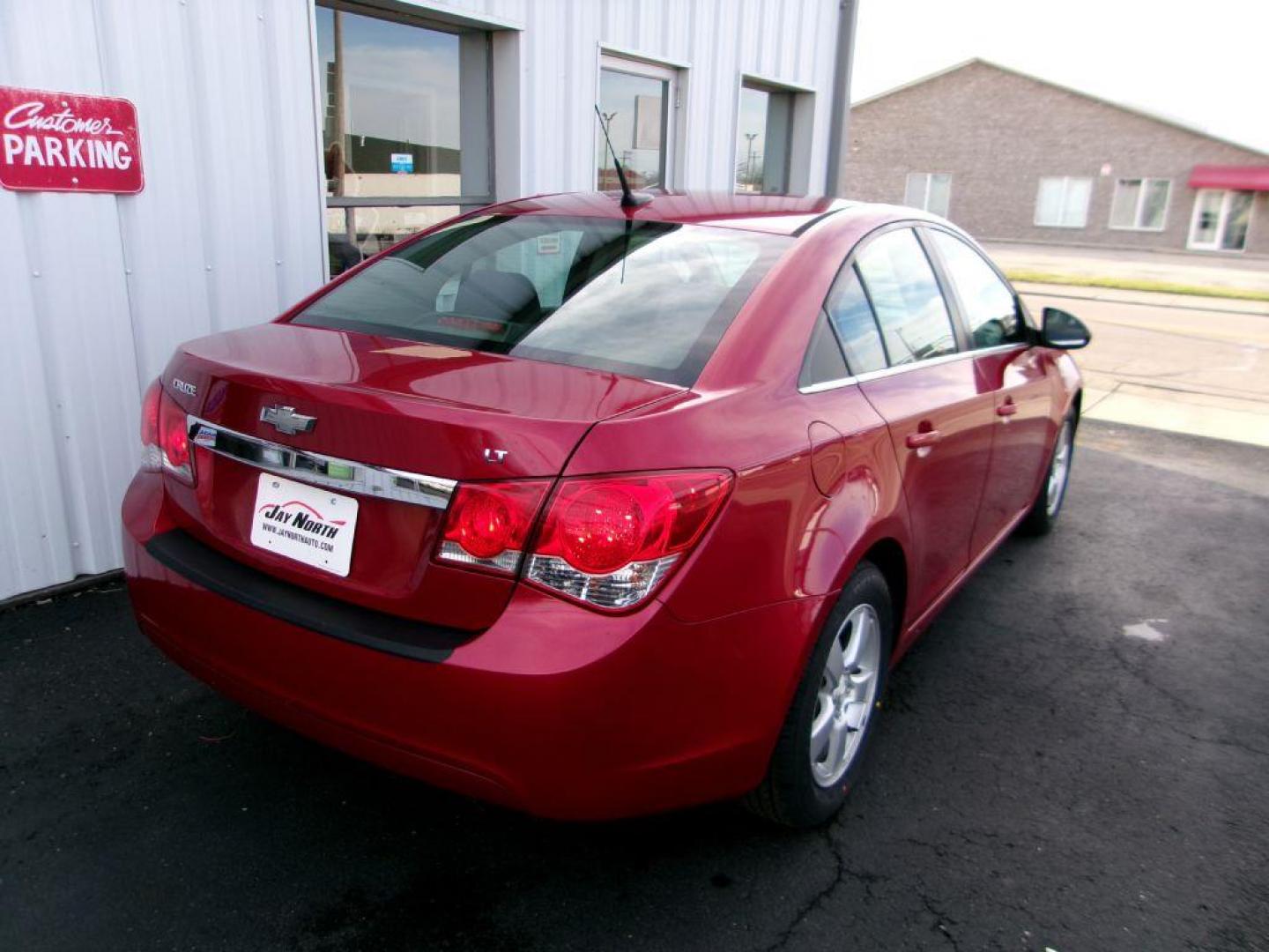 2014 RED CHEVROLET CRUZE LT (1G1PC5SB7E7) with an 1.4L engine, Automatic transmission, located at 501 E. Columbia St., Springfield, OH, 45503, (800) 262-7122, 39.925262, -83.801796 - *** New Tires *** Serviced and Detailed *** New Front Brakes *** Remote Start *** Jay North Auto has offered hand picked vehicles since 1965! Our customer's enjoy a NO pressure buying experience with a small town feel. All of our vehicles get fully inspected and detailed. We are a preferred dea - Photo#3