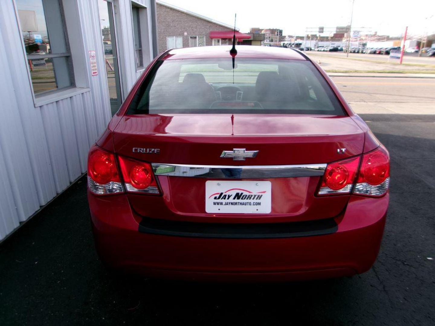 2014 RED CHEVROLET CRUZE LT (1G1PC5SB7E7) with an 1.4L engine, Automatic transmission, located at 501 E. Columbia St., Springfield, OH, 45503, (800) 262-7122, 39.925262, -83.801796 - *** New Tires *** Serviced and Detailed *** New Front Brakes *** Remote Start *** Jay North Auto has offered hand picked vehicles since 1965! Our customer's enjoy a NO pressure buying experience with a small town feel. All of our vehicles get fully inspected and detailed. We are a preferred dea - Photo#4