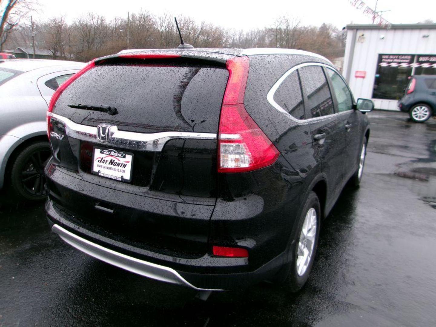 2015 BLACK HONDA CR-V EXL (2HKRM3H72FH) with an 2.4L engine, Continuously Variable transmission, located at 501 E. Columbia St., Springfield, OH, 45503, (800) 262-7122, 39.925262, -83.801796 - *** Serviced and Detailed *** Heated Leather *** Back Up Camera *** Premium Audio *** Moonroof *** Push Button Start *** Jay North Auto has offered hand picked vehicles since 1965! Our customer's enjoy a NO pressure buying experience with a small town feel. All of our vehicles get fully inspect - Photo#5