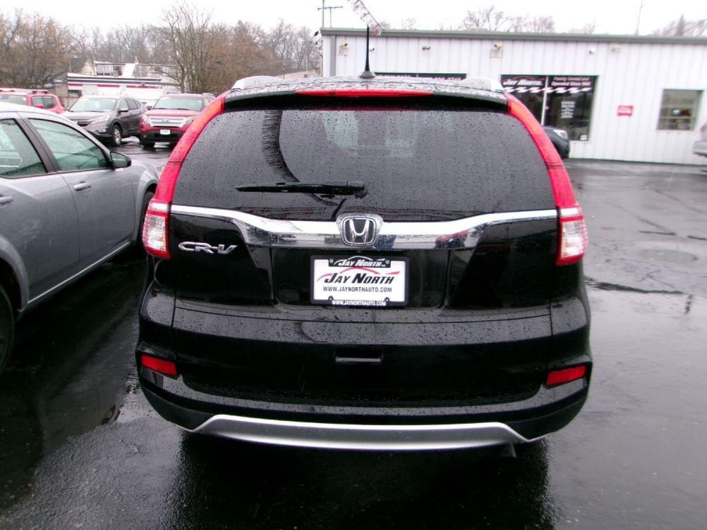 2015 BLACK HONDA CR-V EXL (2HKRM3H72FH) with an 2.4L engine, Continuously Variable transmission, located at 501 E. Columbia St., Springfield, OH, 45503, (800) 262-7122, 39.925262, -83.801796 - *** Serviced and Detailed *** Heated Leather *** Back Up Camera *** Premium Audio *** Moonroof *** Push Button Start *** Jay North Auto has offered hand picked vehicles since 1965! Our customer's enjoy a NO pressure buying experience with a small town feel. All of our vehicles get fully inspect - Photo#6