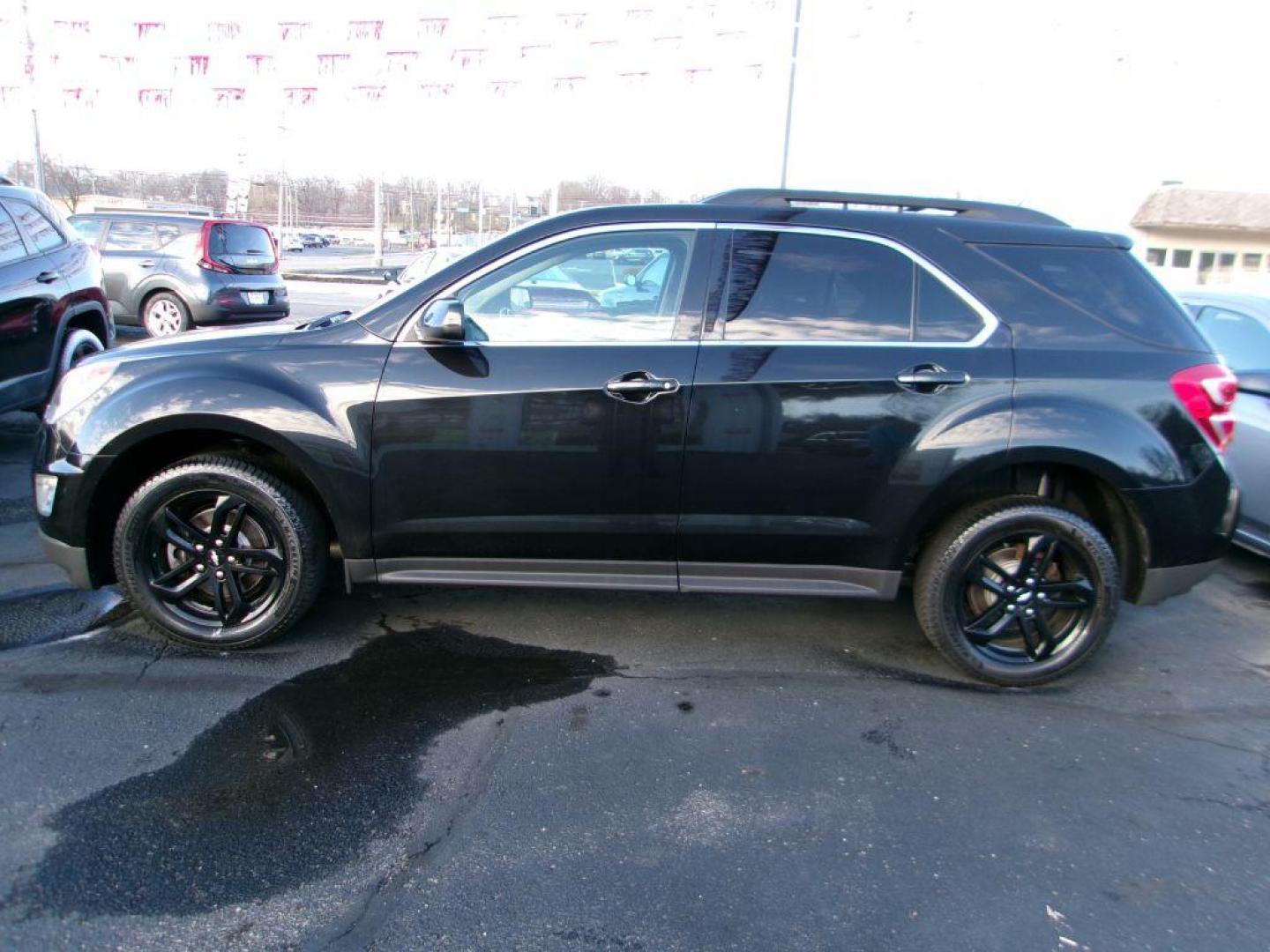 2017 BLACK CHEVROLET EQUINOX LT (2GNFLFEK9H6) with an 2.4L engine, Automatic transmission, located at 501 E. Columbia St., Springfield, OH, 45503, (800) 262-7122, 39.925262, -83.801796 - ***LT***AWD***Heated Leather Seating***Memory Seating***Serviced and Detailed*** Jay North Auto has offered hand picked vehicles since 1965! Our customer's enjoy a NO pressure buying experience with a small town feel. All of our vehicles get fully inspected and detailed. We are a preferred dea - Photo#0