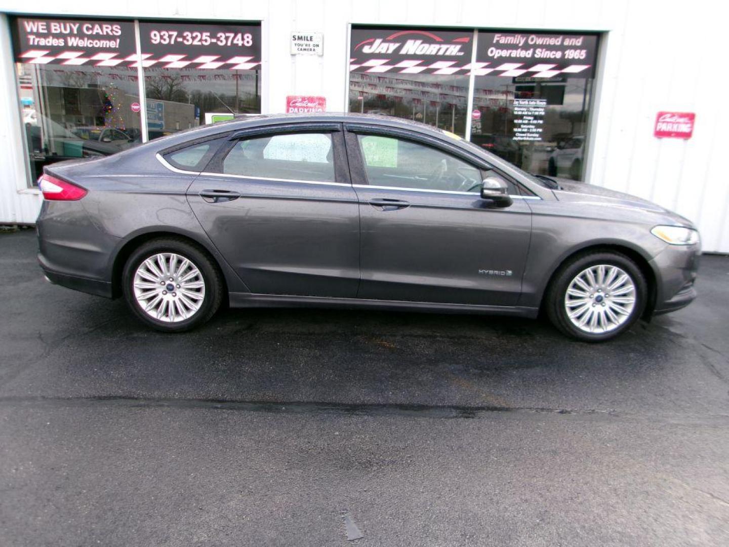 2016 GRAY FORD FUSION SE HYBRID (3FA6P0LU7GR) with an 2.0L engine, Continuously Variable transmission, located at 501 E. Columbia St., Springfield, OH, 45503, (800) 262-7122, 39.925262, -83.801796 - ***SE***Hybrid***Serviced and Detailed*** GREAT MPG *** Jay North Auto has offered hand picked vehicles since 1965! Our customer's enjoy a NO pressure buying experience with a small town feel. All of our vehicles get fully inspected and detailed. We are a preferred dealer for many local credit u - Photo#0