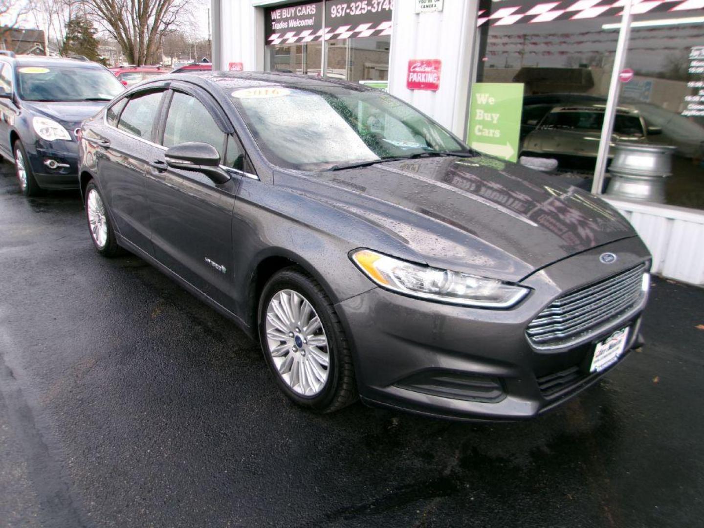 2016 GRAY FORD FUSION SE HYBRID (3FA6P0LU7GR) with an 2.0L engine, Continuously Variable transmission, located at 501 E. Columbia St., Springfield, OH, 45503, (800) 262-7122, 39.925262, -83.801796 - ***SE***Hybrid***Serviced and Detailed*** GREAT MPG *** Jay North Auto has offered hand picked vehicles since 1965! Our customer's enjoy a NO pressure buying experience with a small town feel. All of our vehicles get fully inspected and detailed. We are a preferred dealer for many local credit u - Photo#1