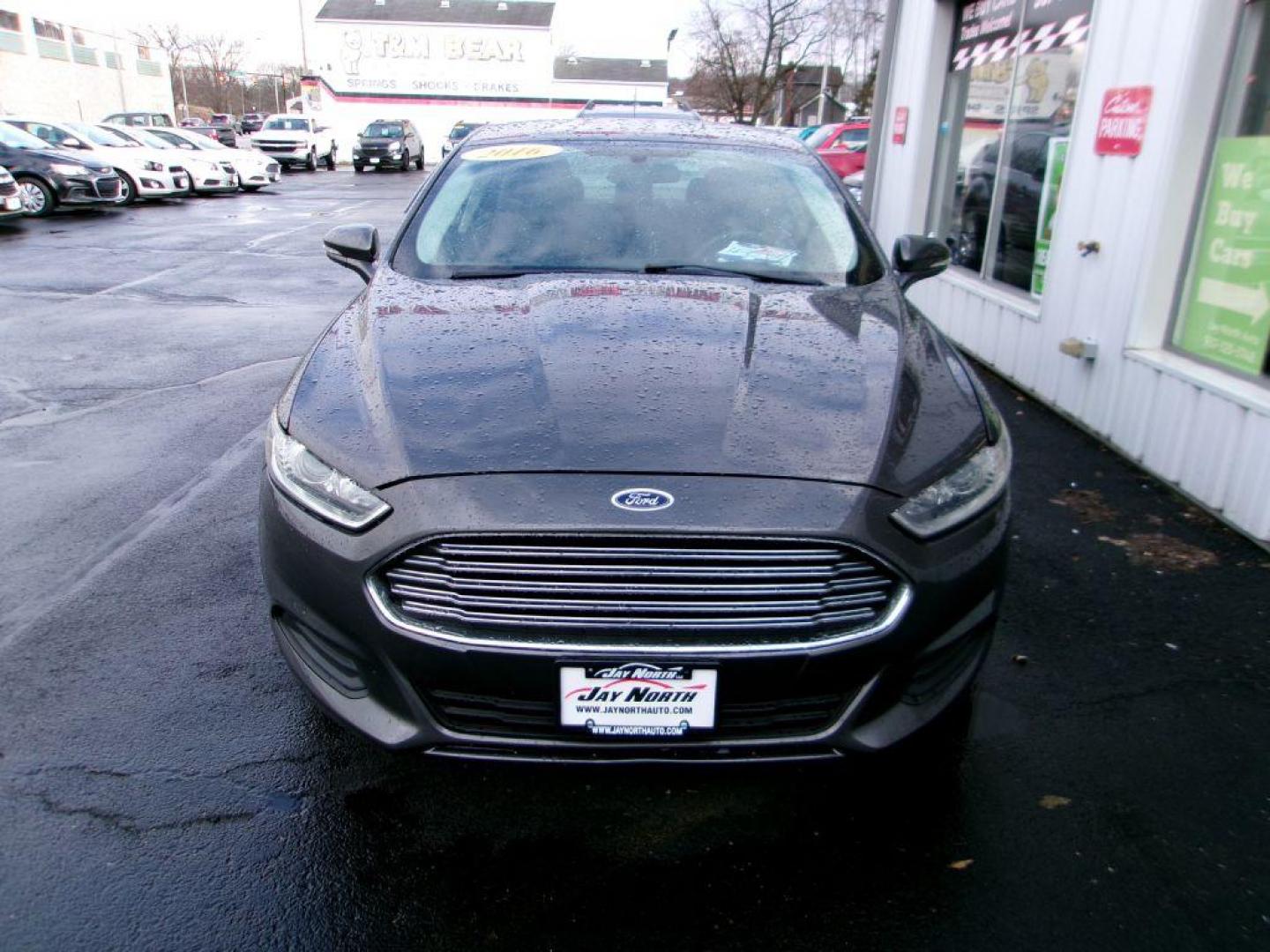 2016 GRAY FORD FUSION SE HYBRID (3FA6P0LU7GR) with an 2.0L engine, Continuously Variable transmission, located at 501 E. Columbia St., Springfield, OH, 45503, (800) 262-7122, 39.925262, -83.801796 - ***SE***Hybrid***Serviced and Detailed*** GREAT MPG *** Jay North Auto has offered hand picked vehicles since 1965! Our customer's enjoy a NO pressure buying experience with a small town feel. All of our vehicles get fully inspected and detailed. We are a preferred dealer for many local credit u - Photo#2