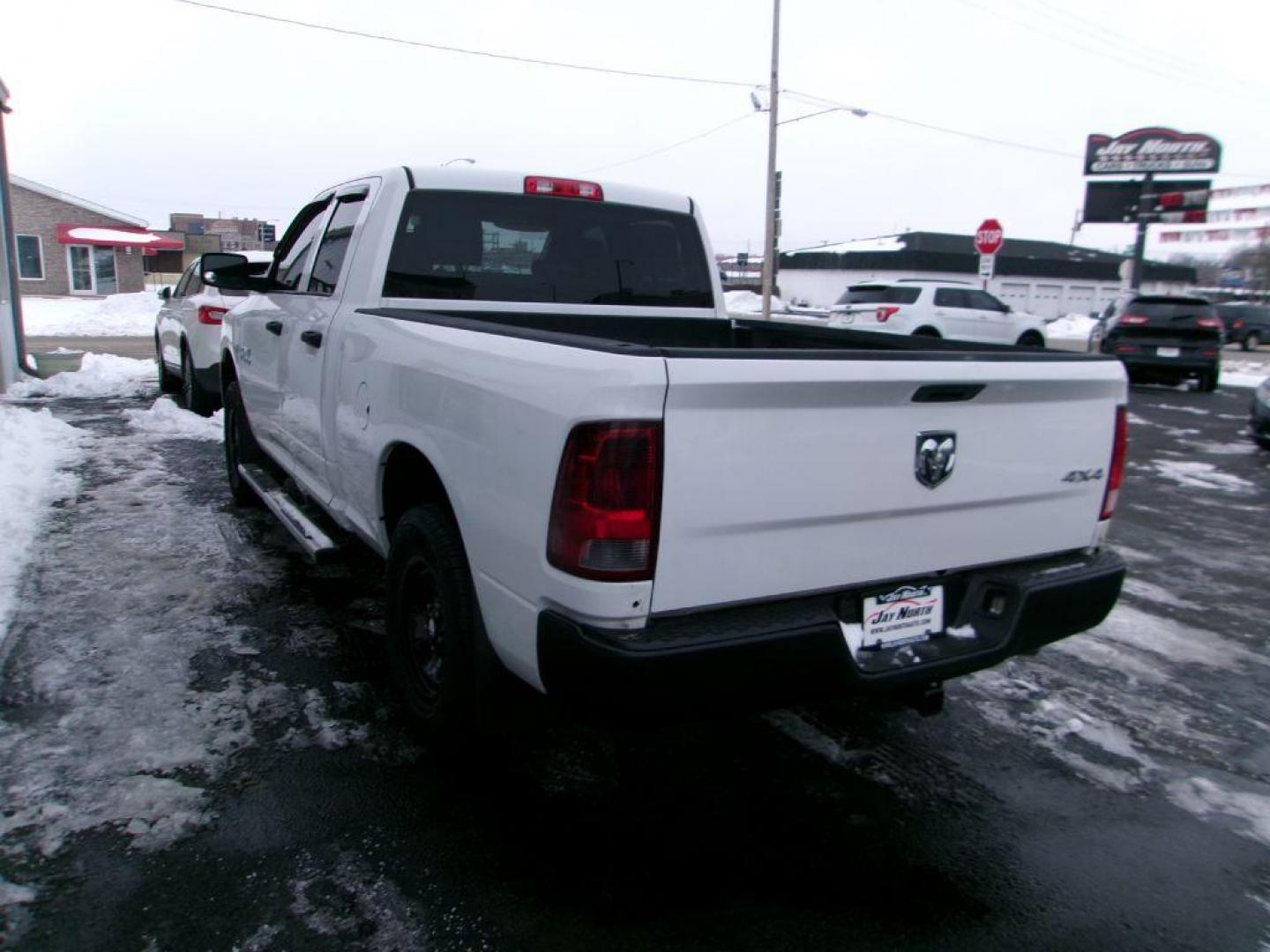 2014 WHITE RAM 1500 TRADESMAN (1C6RR7FT4ES) with an 5.7L engine, Automatic transmission, located at 501 E. Columbia St., Springfield, OH, 45503, (800) 262-7122, 39.925262, -83.801796 - ***New Tires***Crew Cab***Tradesman***HEMI 5.7L V8***4X4***Serviced and Detailed*** Jay North Auto has offered hand picked vehicles since 1965! Our customer's enjoy a NO pressure buying experience with a small town feel. All of our vehicles get fully inspected and detailed. We are a preferred - Photo#5