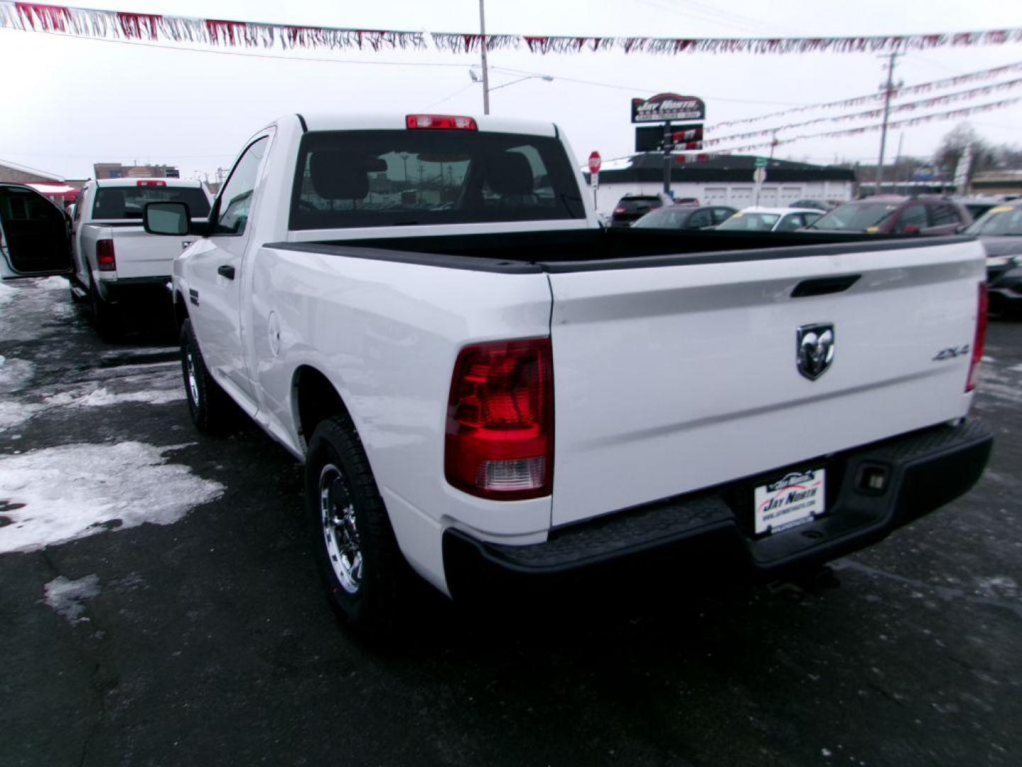 2016 WHITE RAM 1500 TRADESMAN (3C6JR6AG3GG) with an 3.6L engine, Automatic transmission, located at 501 E. Columbia St., Springfield, OH, 45503, (800) 262-7122, 39.925262, -83.801796 - ***Clean Carfax***Tradesman***Ram 1500***Bed Liner***Back-up Camera***New Tires***Serviced and Detailed*** Jay North Auto has offered hand picked vehicles since 1965! Our customer's enjoy a NO pressure buying experience with a small town feel. All of our vehicles get fully inspected and detailed - Photo#5