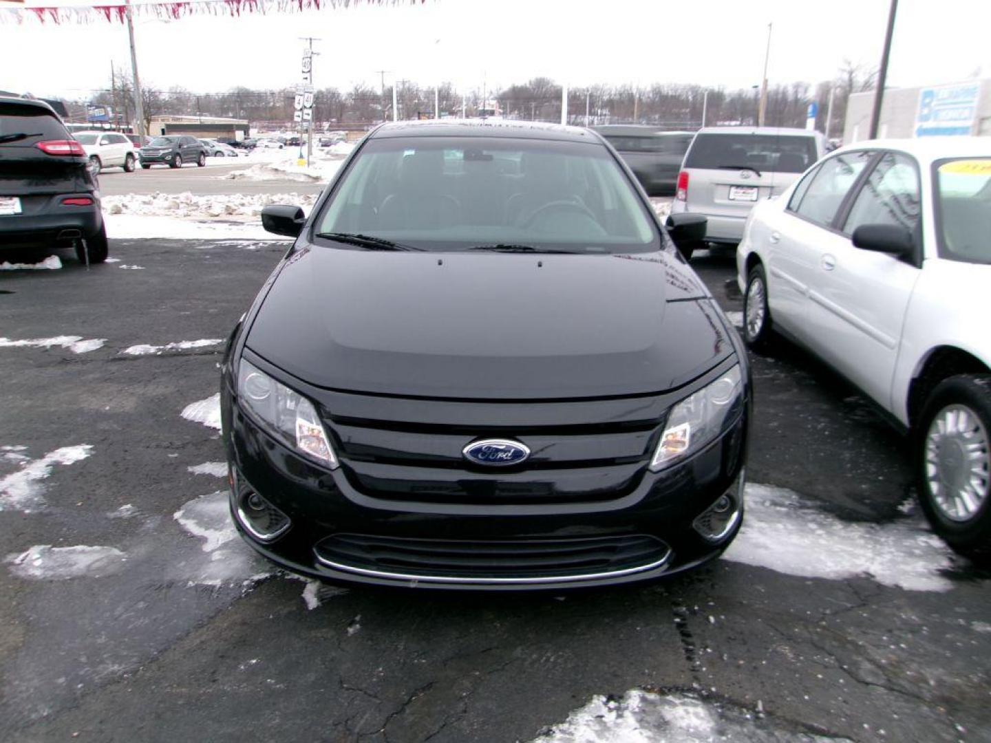 2012 BLACK FORD FUSION SEL (3FAHP0JA4CR) with an 2.5L engine, Automatic transmission, located at 501 E. Columbia St., Springfield, OH, 45503, (800) 262-7122, 39.925262, -83.801796 - *** SEL *** FWD *** Serviced and Detailed *** Sony Audio *** Moonroof *** Leather *** Jay North Auto has offered hand picked vehicles since 1965! Our customer's enjoy a NO pressure buying experience with a small town feel. All of our vehicles get fully inspected and detailed. We are a preferred - Photo#1