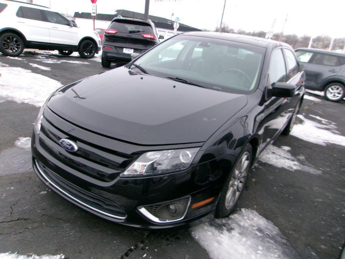 2012 BLACK FORD FUSION SEL (3FAHP0JA4CR) with an 2.5L engine, Automatic transmission, located at 501 E. Columbia St., Springfield, OH, 45503, (800) 262-7122, 39.925262, -83.801796 - *** SEL *** FWD *** Serviced and Detailed *** Sony Audio *** Moonroof *** Leather *** Jay North Auto has offered hand picked vehicles since 1965! Our customer's enjoy a NO pressure buying experience with a small town feel. All of our vehicles get fully inspected and detailed. We are a preferred - Photo#6