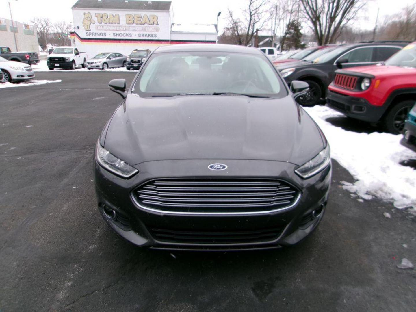 2016 GRAY FORD FUSION SE (3FA6P0H71GR) with an 2.5L engine, Automatic transmission, located at 501 E. Columbia St., Springfield, OH, 45503, (800) 262-7122, 39.925262, -83.801796 - *** New Tires *** SE Appearance Package *** Alloy Wheels *** Serviced and Detailed *** Jay North Auto has offered hand picked vehicles since 1965! Our customer's enjoy a NO pressure buying experience with a small town feel. All of our vehicles get fully inspected and detailed. We are a preferred - Photo#2