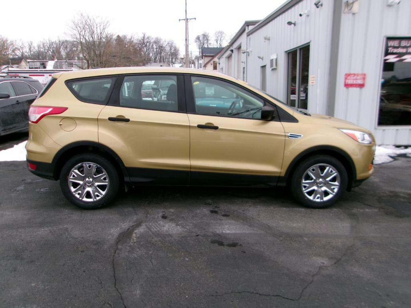 2014 GOLD FORD ESCAPE S (1FMCU0F78EU) with an 2.5L engine, Automatic transmission, located at 501 E. Columbia St., Springfield, OH, 45503, (800) 262-7122, 39.925262, -83.801796 - ***Clean Carfax***New Front and Rear Pads and Rotors***S 2.5L***Serviced and Detailed*** Jay North Auto has offered hand picked vehicles since 1965! Our customer's enjoy a NO pressure buying experience with a small town feel. All of our vehicles get fully inspected and detailed. We are a prefe - Photo#0