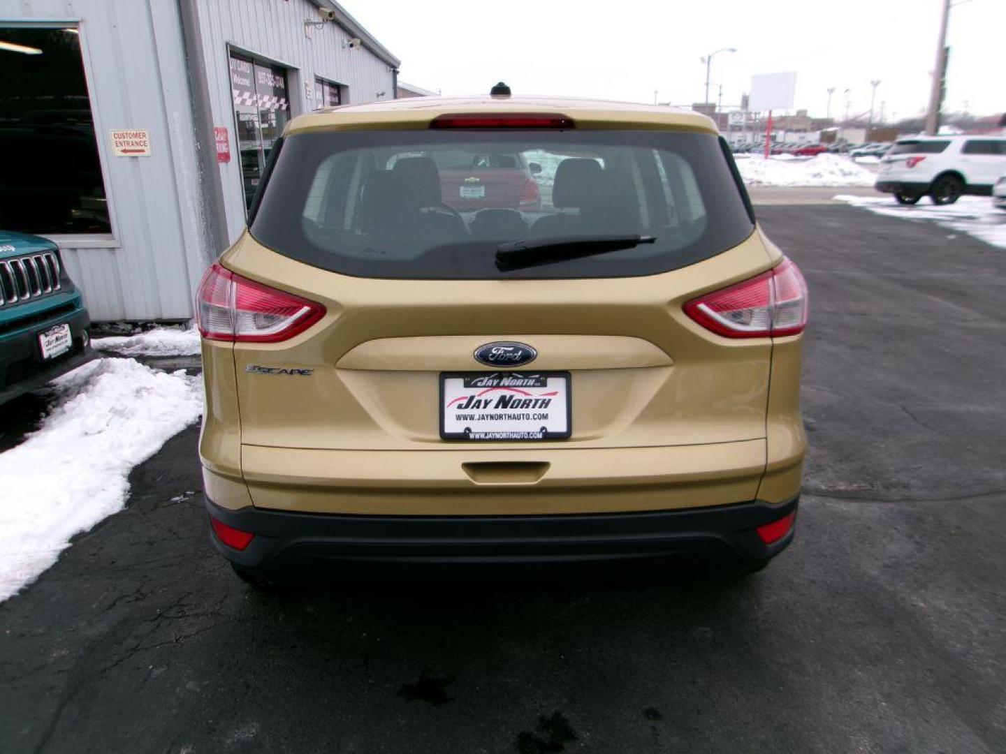 2014 GOLD FORD ESCAPE S (1FMCU0F78EU) with an 2.5L engine, Automatic transmission, located at 501 E. Columbia St., Springfield, OH, 45503, (800) 262-7122, 39.925262, -83.801796 - ***Clean Carfax***New Front and Rear Pads and Rotors***S 2.5L***Serviced and Detailed*** Jay North Auto has offered hand picked vehicles since 1965! Our customer's enjoy a NO pressure buying experience with a small town feel. All of our vehicles get fully inspected and detailed. We are a prefe - Photo#4