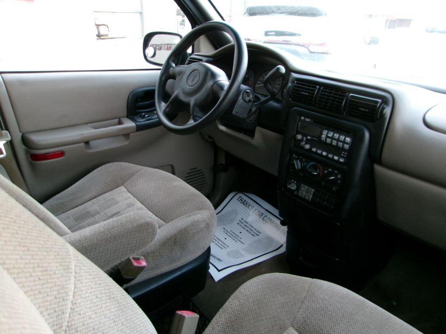 2005 TAN PONTIAC MONTANA (1GMDV23E55D) with an 3.4L engine, Automatic transmission, located at 501 E. Columbia St., Springfield, OH, 45503, (800) 262-7122, 39.925262, -83.801796 - *** Local Trade *** Serviced and Detailed *** 3.4L V6 *** NICE!!! *** Dual Sliding Doors *** Fold Down Seating *** Newer Tires *** Jay North Auto has offered hand picked vehicles since 1965! Our customer's enjoy a NO pressure buying experience with a small town feel. All of our vehicles get fu - Photo#14