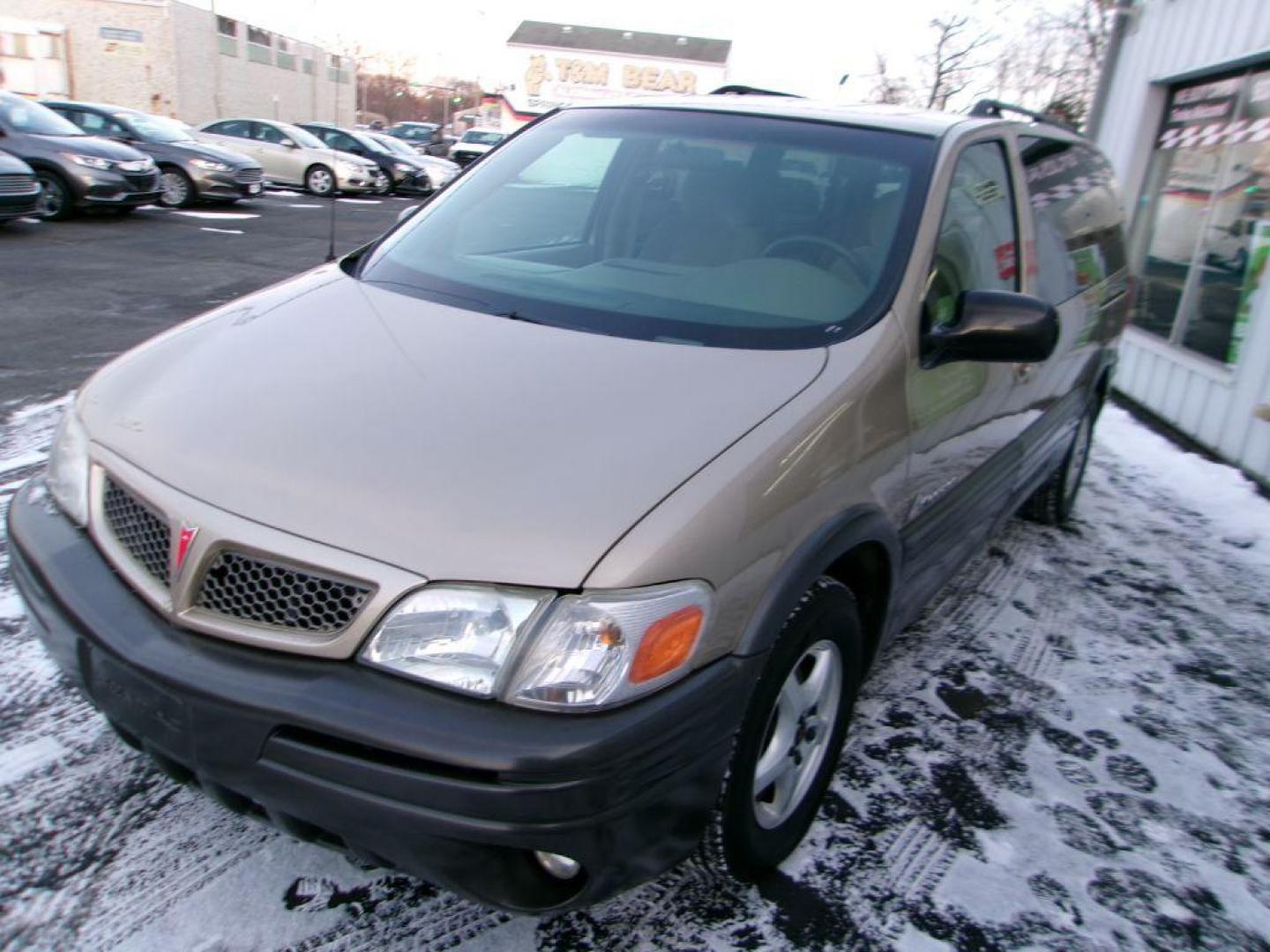 2005 TAN PONTIAC MONTANA (1GMDV23E55D) with an 3.4L engine, Automatic transmission, located at 501 E. Columbia St., Springfield, OH, 45503, (800) 262-7122, 39.925262, -83.801796 - *** Local Trade *** Serviced and Detailed *** 3.4L V6 *** NICE!!! *** Dual Sliding Doors *** Fold Down Seating *** Newer Tires *** Jay North Auto has offered hand picked vehicles since 1965! Our customer's enjoy a NO pressure buying experience with a small town feel. All of our vehicles get fu - Photo#3