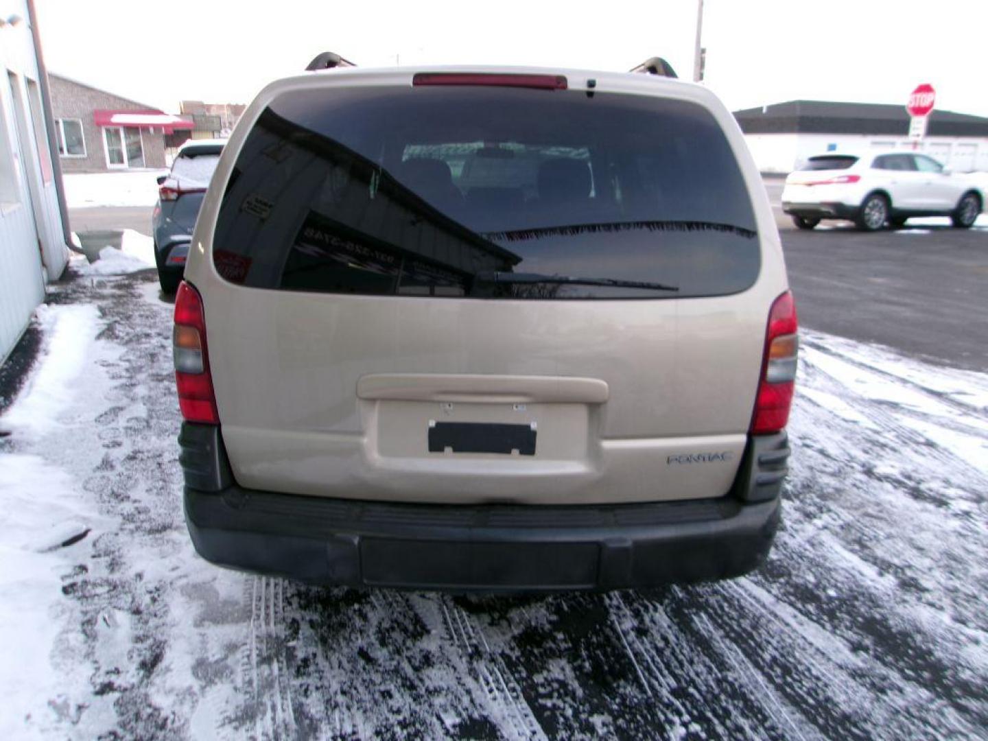 2005 TAN PONTIAC MONTANA (1GMDV23E55D) with an 3.4L engine, Automatic transmission, located at 501 E. Columbia St., Springfield, OH, 45503, (800) 262-7122, 39.925262, -83.801796 - *** Local Trade *** Serviced and Detailed *** 3.4L V6 *** NICE!!! *** Dual Sliding Doors *** Fold Down Seating *** Newer Tires *** Jay North Auto has offered hand picked vehicles since 1965! Our customer's enjoy a NO pressure buying experience with a small town feel. All of our vehicles get fu - Photo#4