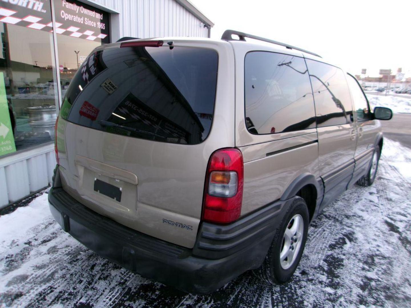 2005 TAN PONTIAC MONTANA (1GMDV23E55D) with an 3.4L engine, Automatic transmission, located at 501 E. Columbia St., Springfield, OH, 45503, (800) 262-7122, 39.925262, -83.801796 - *** Local Trade *** Serviced and Detailed *** 3.4L V6 *** NICE!!! *** Dual Sliding Doors *** Fold Down Seating *** Newer Tires *** Jay North Auto has offered hand picked vehicles since 1965! Our customer's enjoy a NO pressure buying experience with a small town feel. All of our vehicles get fu - Photo#5