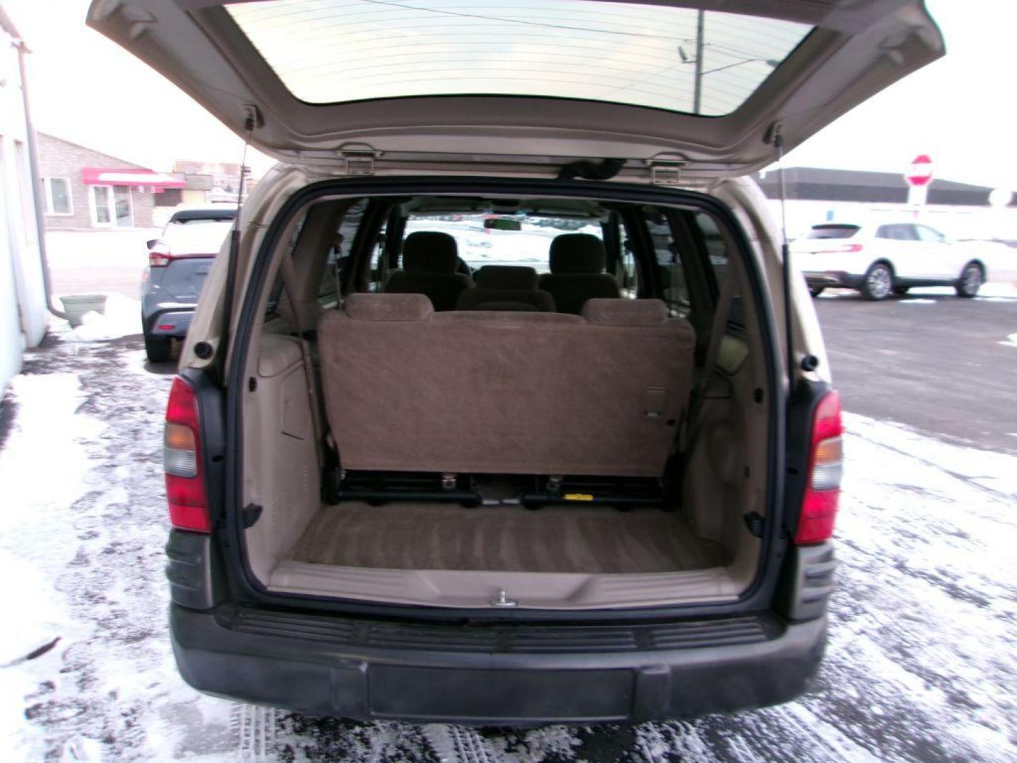 2005 TAN PONTIAC MONTANA (1GMDV23E55D) with an 3.4L engine, Automatic transmission, located at 501 E. Columbia St., Springfield, OH, 45503, (800) 262-7122, 39.925262, -83.801796 - *** Local Trade *** Serviced and Detailed *** 3.4L V6 *** NICE!!! *** Dual Sliding Doors *** Fold Down Seating *** Newer Tires *** Jay North Auto has offered hand picked vehicles since 1965! Our customer's enjoy a NO pressure buying experience with a small town feel. All of our vehicles get fu - Photo#6