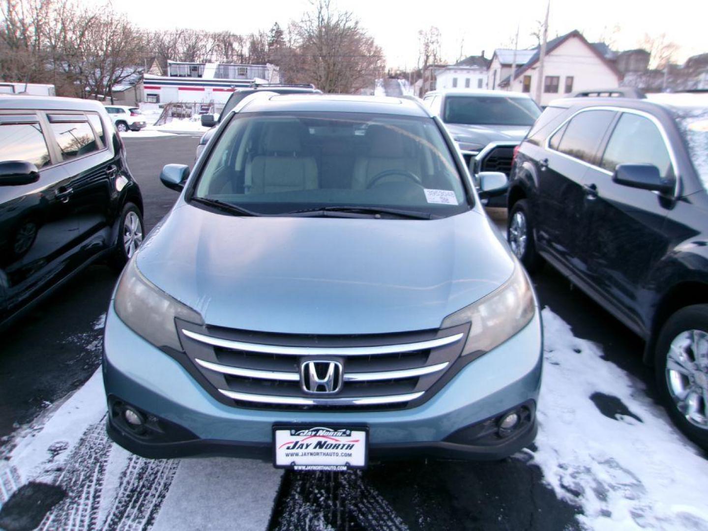 2014 BLUE HONDA CR-V EXL (2HKRM4H77EH) with an 2.4L engine, Automatic transmission, located at 501 E. Columbia St., Springfield, OH, 45503, (800) 262-7122, 39.925262, -83.801796 - *** Updated Timing w/ Honda Parts *** New Tires *** Serviced and Detailed *** New TIres *** Moonroof *** Heated Leather Seating *** NICE *** EXL AWD *** Jay North Auto has offered hand picked vehicles since 1965! Our customer's enjoy a NO pressure buying experience with a small town feel. All of - Photo#1